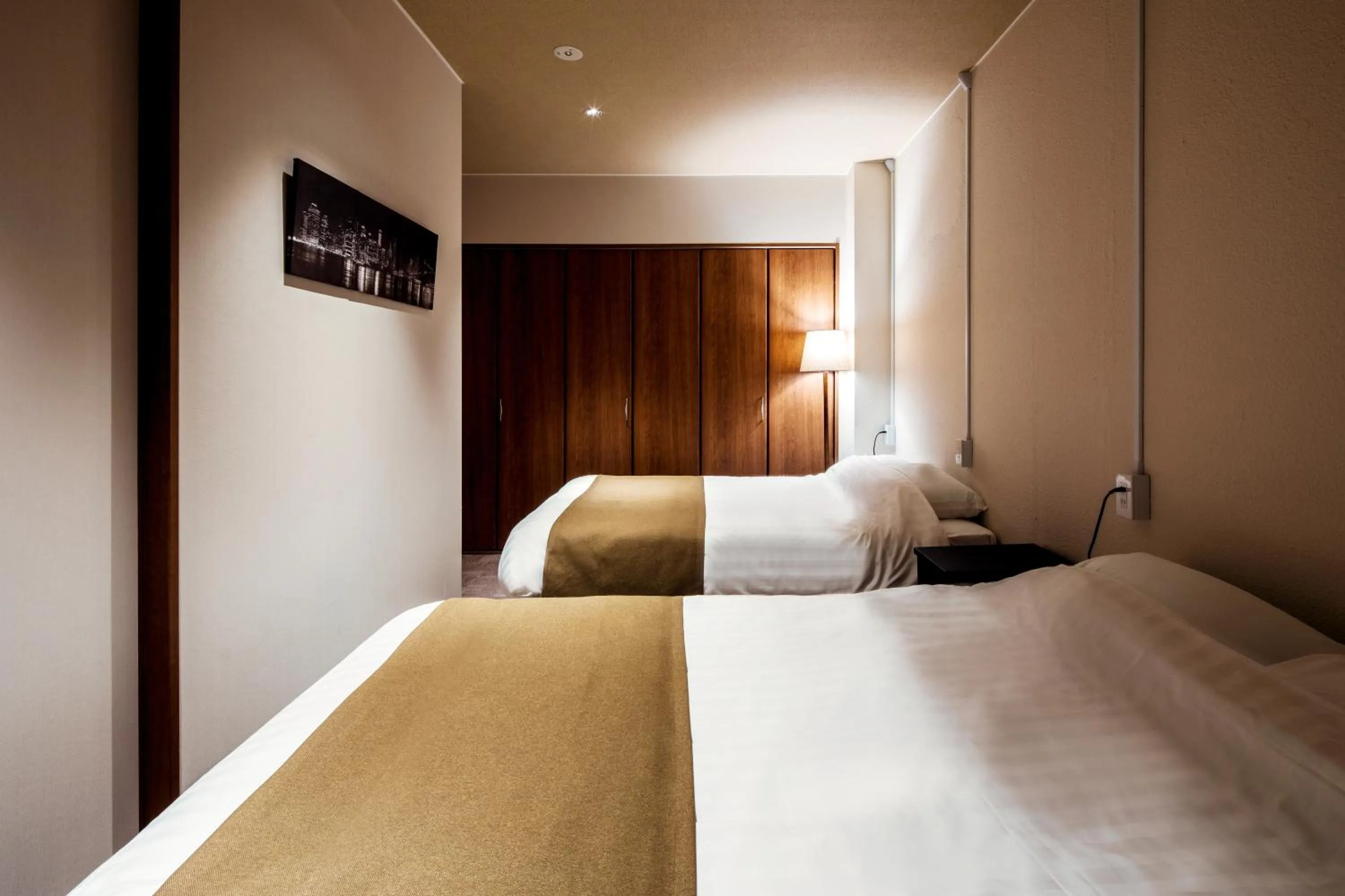 Bed in Randor Residence Hiroshima Suites