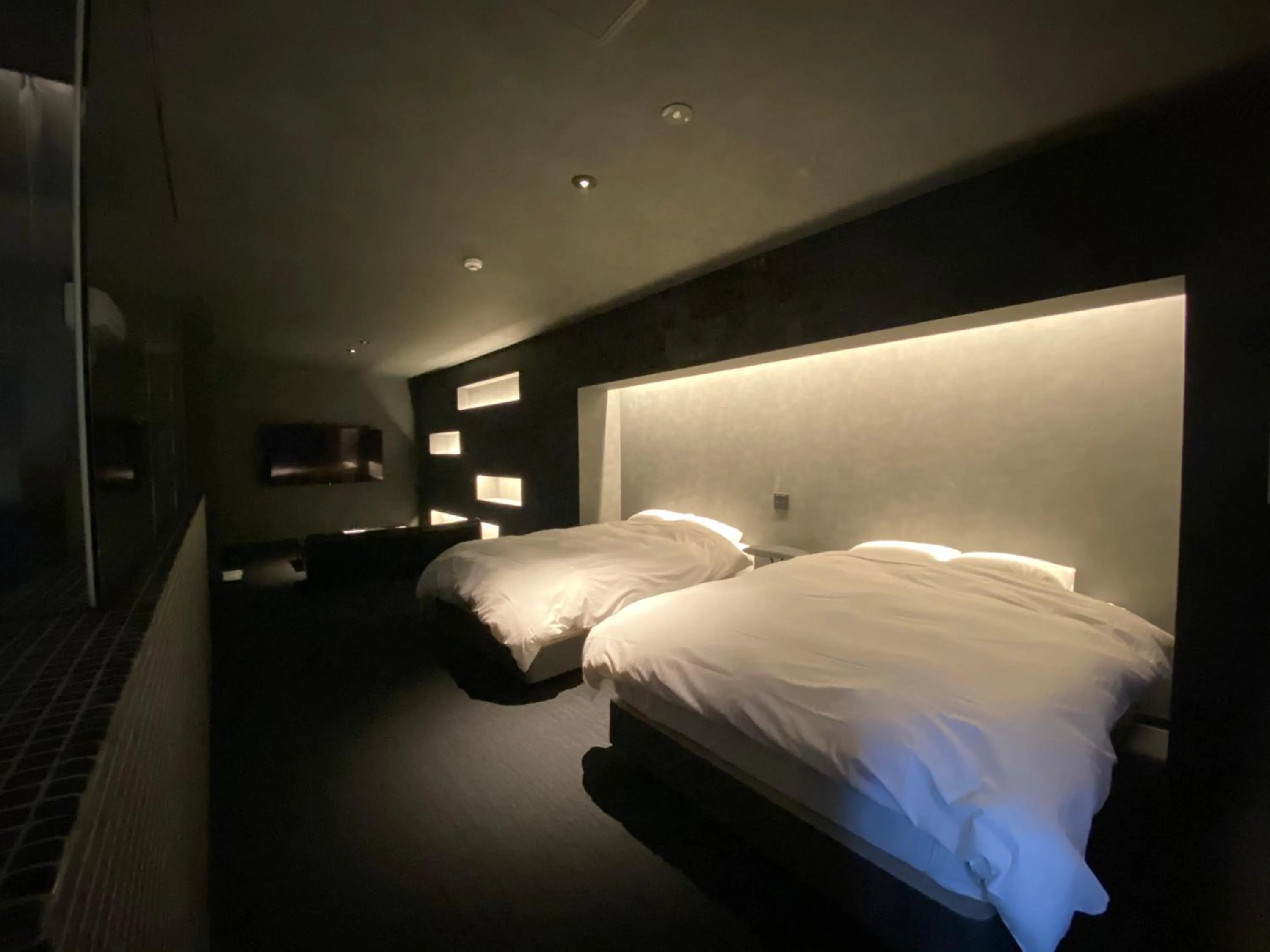 Photo of the whole room, Bed in Randor Residence Hiroshima Suites