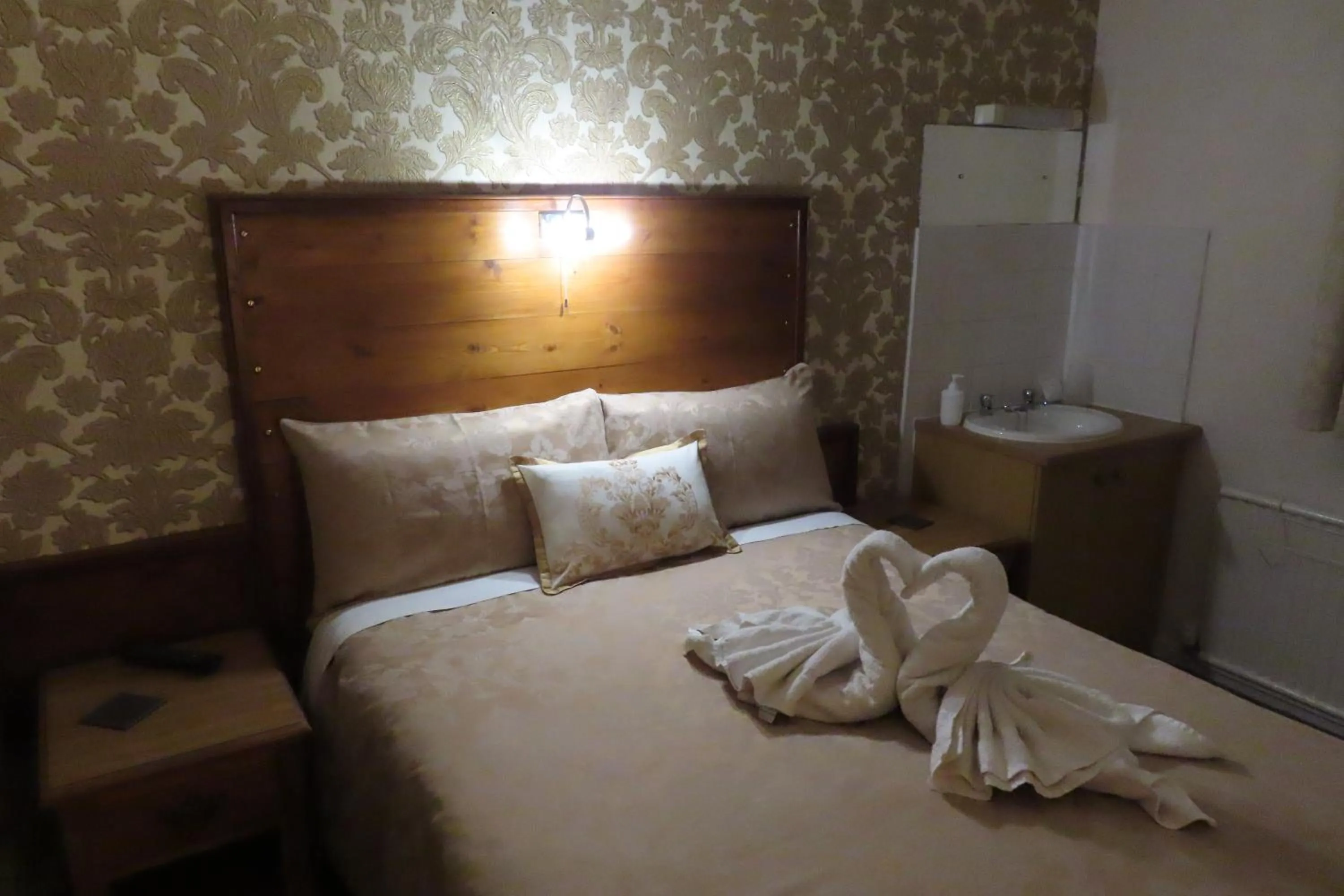 Bed in The Rowan Hotel