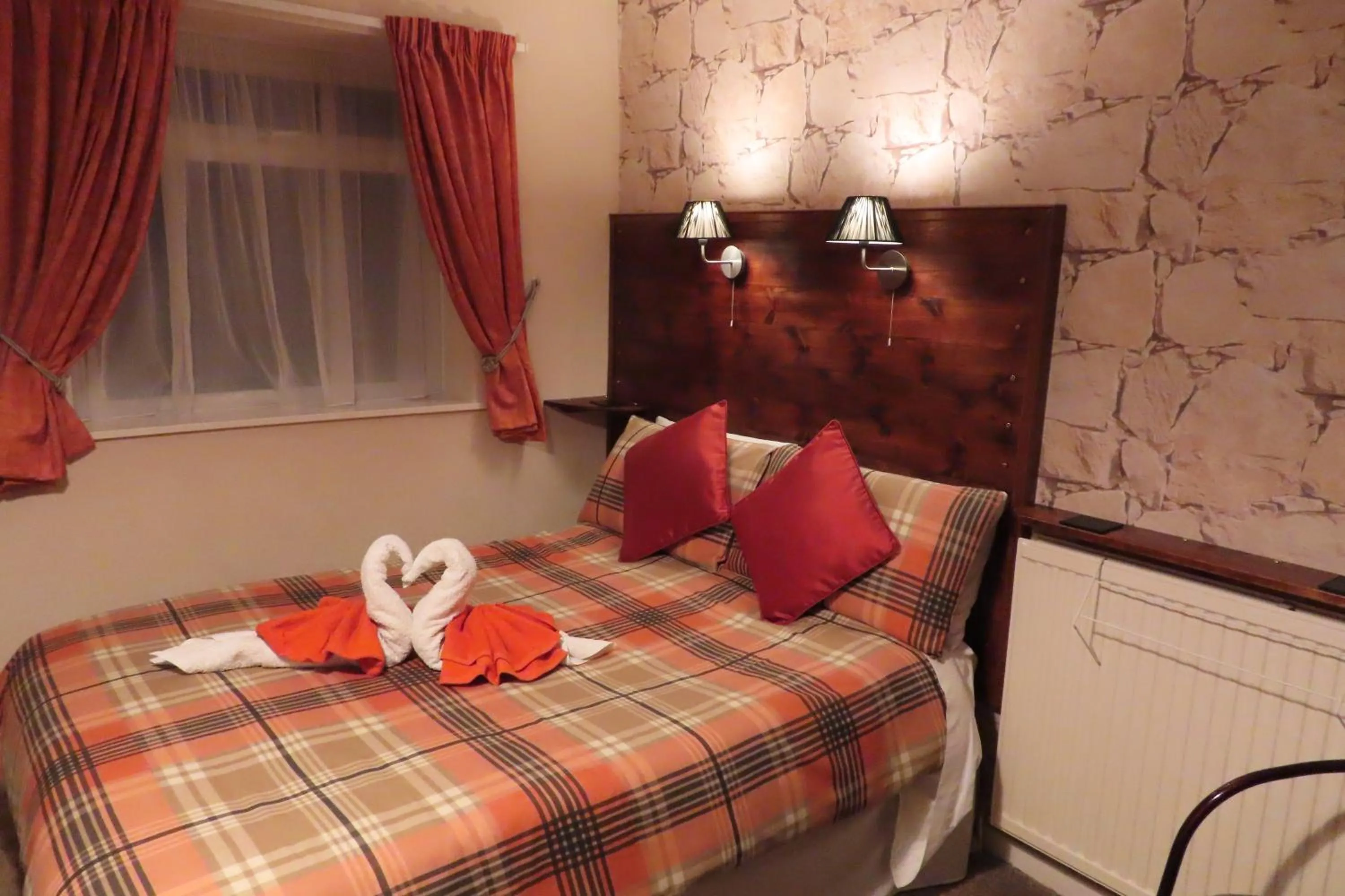 Bed in The Rowan Hotel