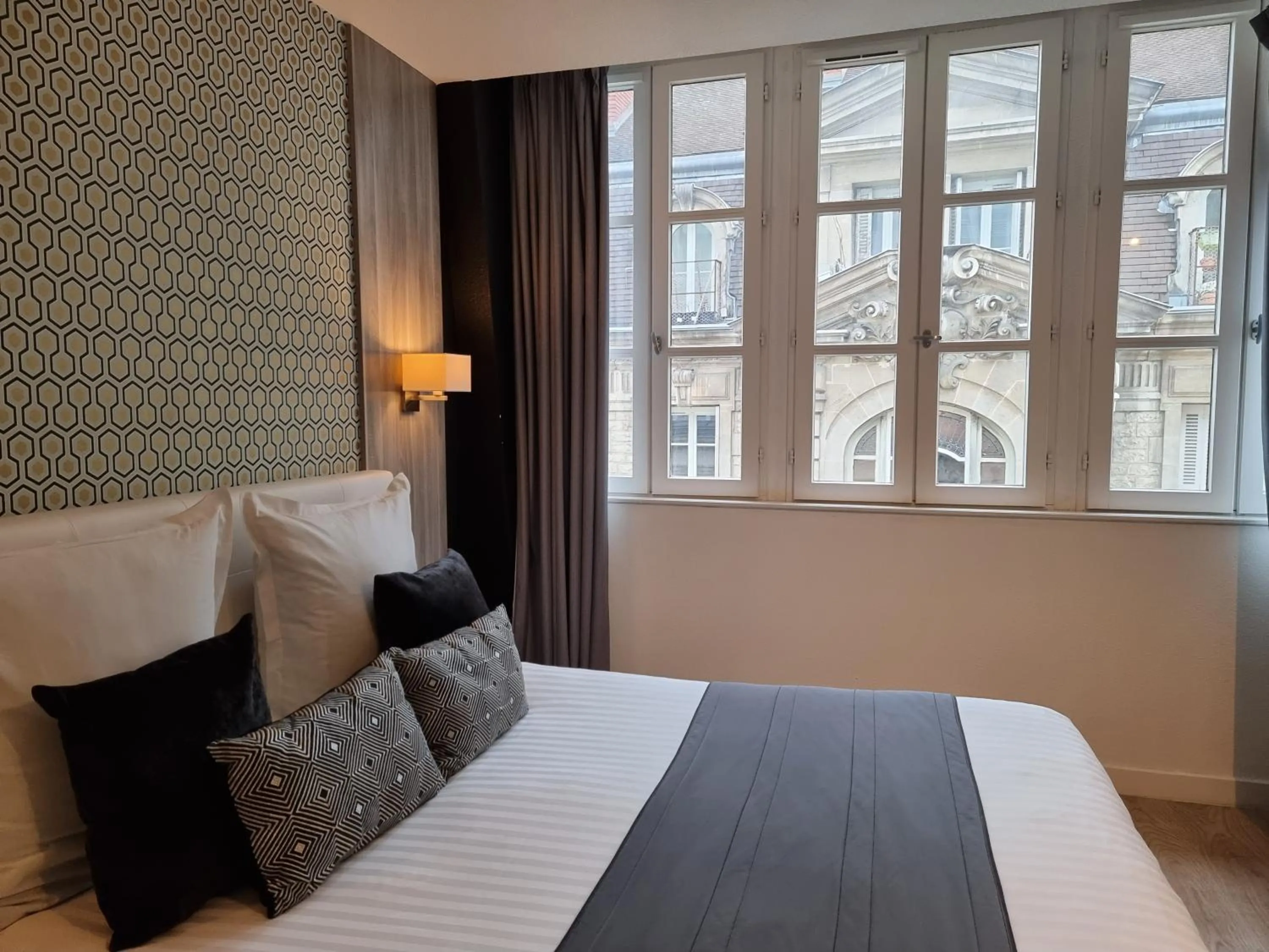 Bed in City Loft Apparthotel