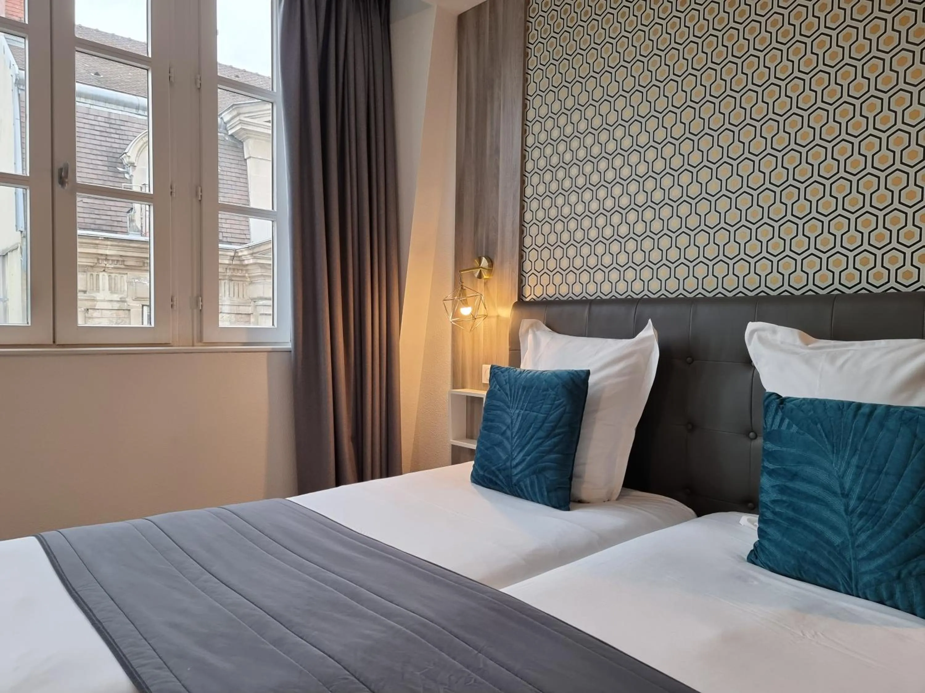 Bed in City Loft Apparthotel