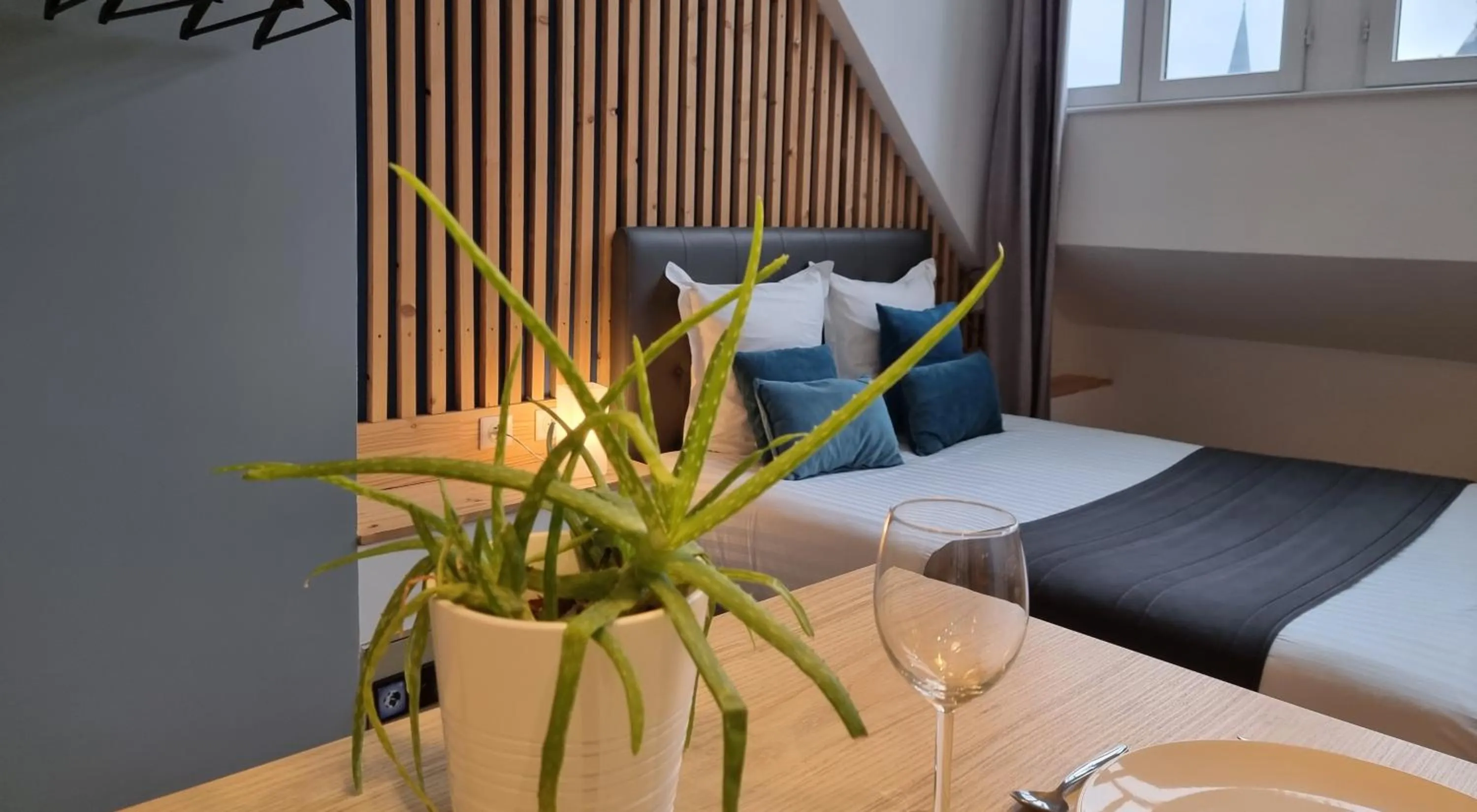 Bed in City Loft Apparthotel