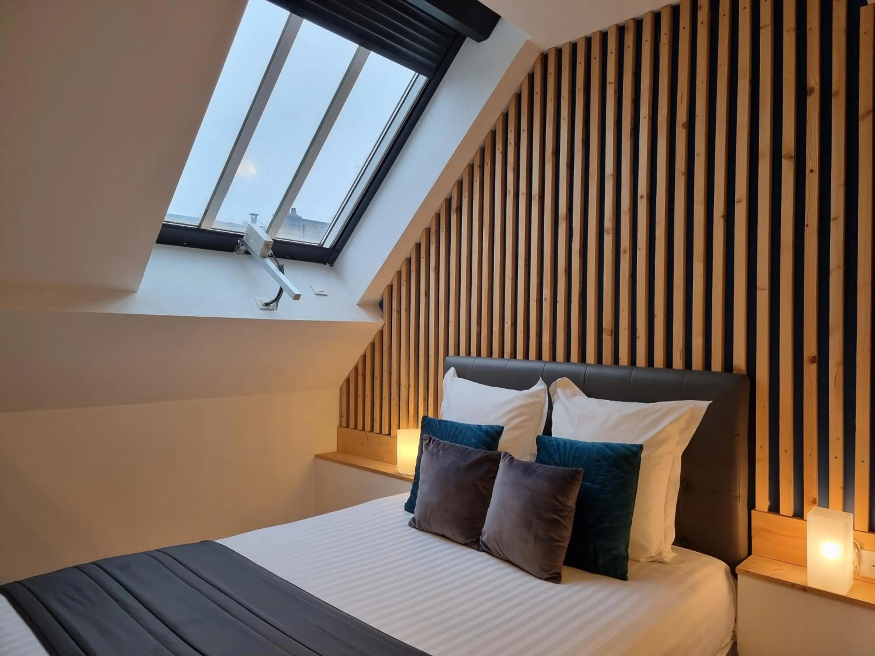 Bed in City Loft Apparthotel