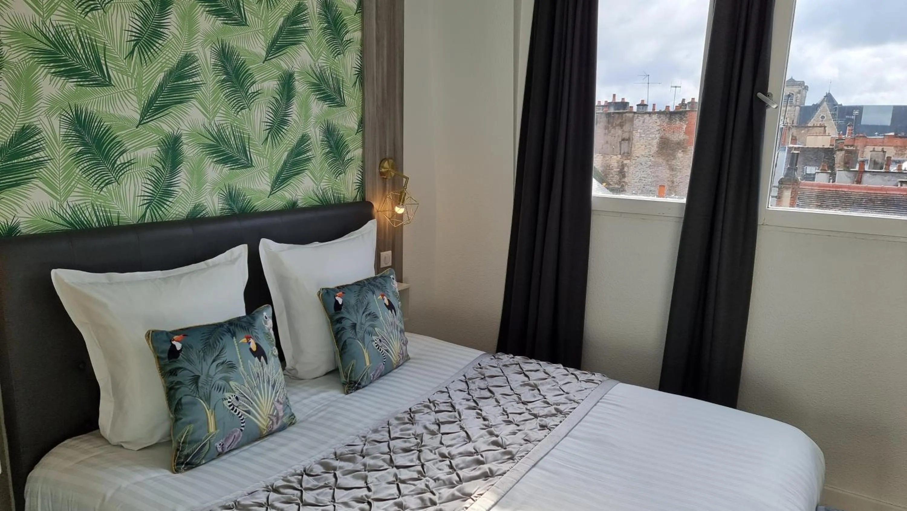 Bed in City Loft Apparthotel