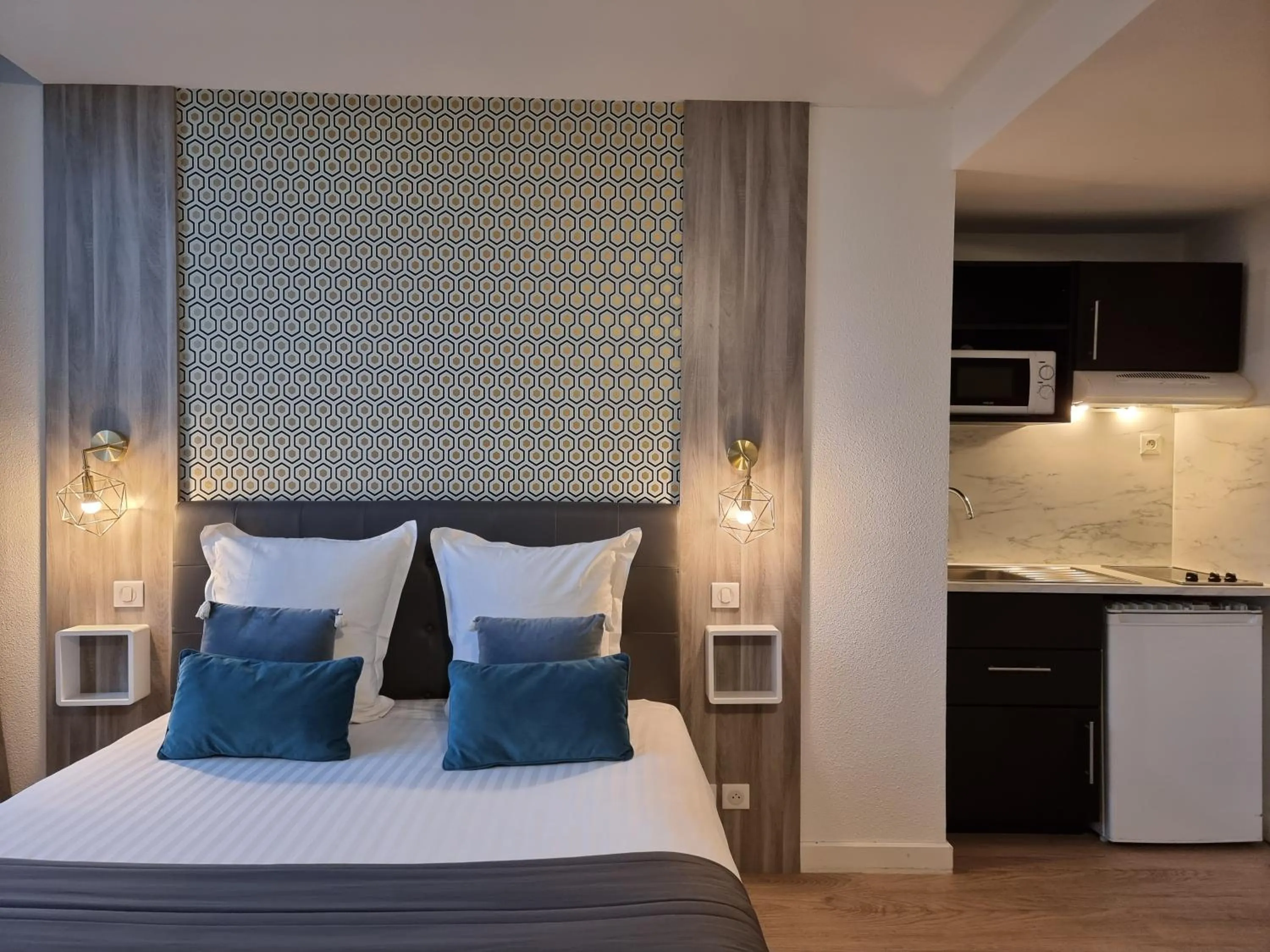 Bed in City Loft Apparthotel