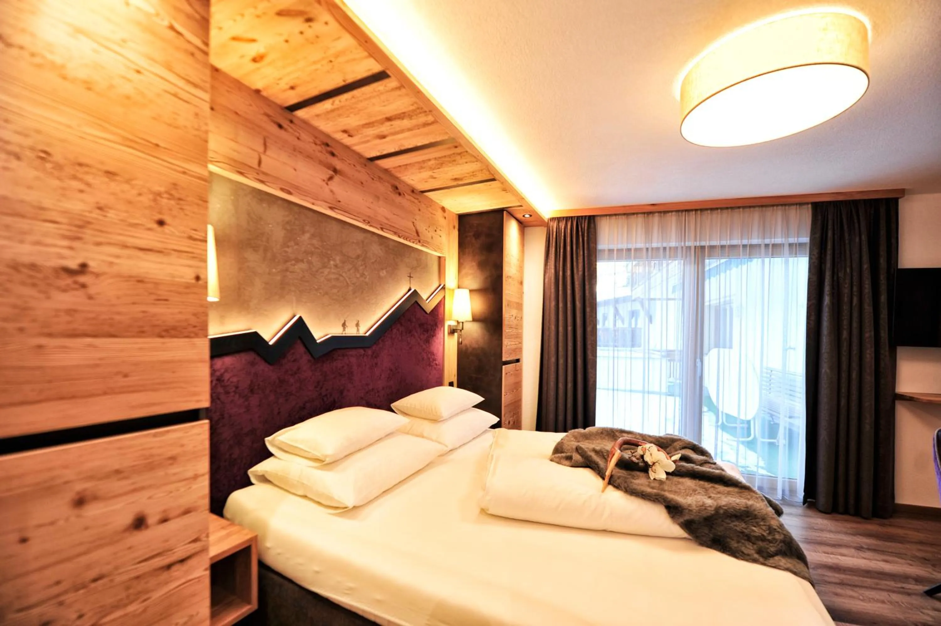 Bed in Hotel Garni Bellevue