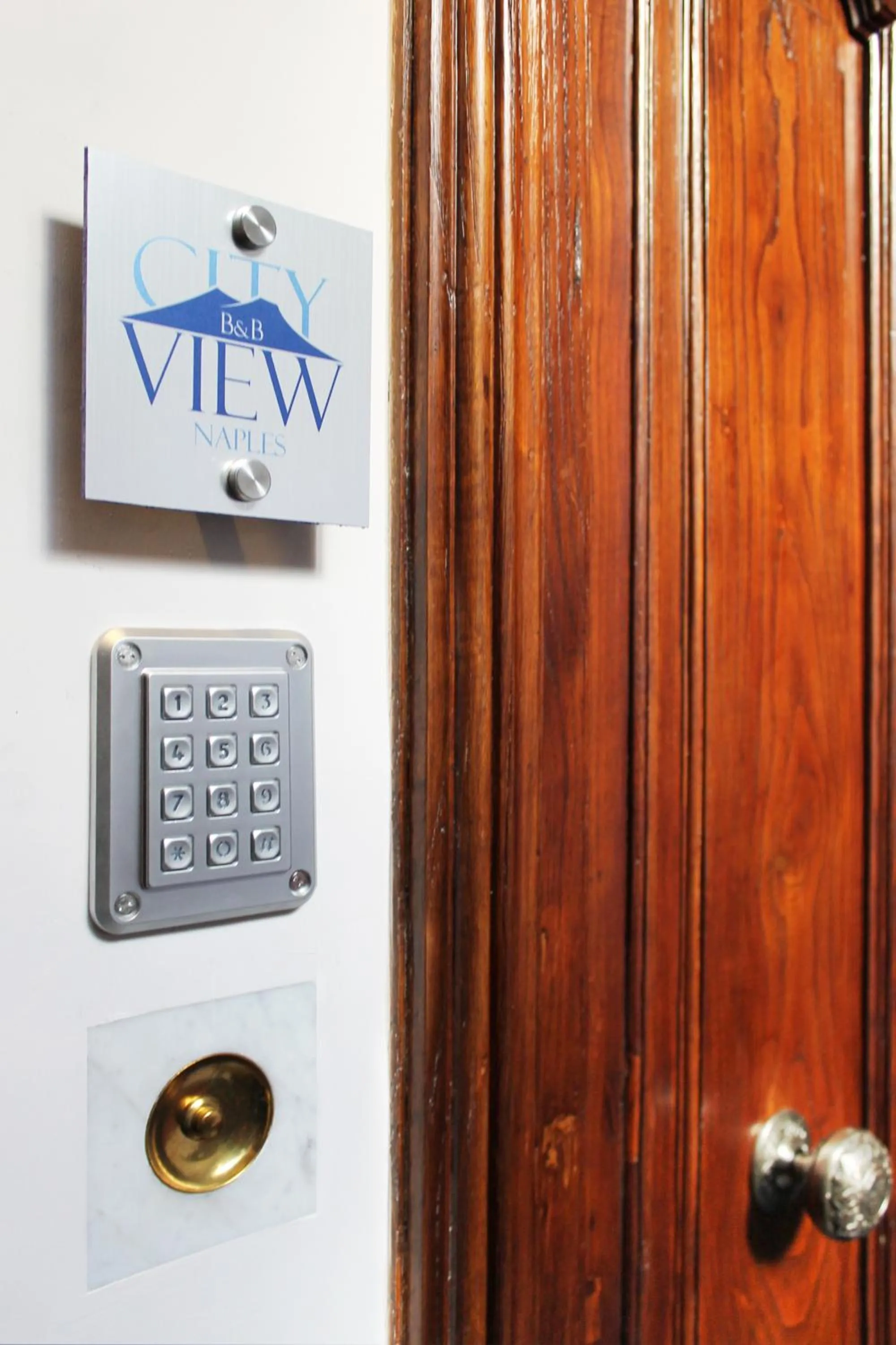 Property logo or sign in City View Naples