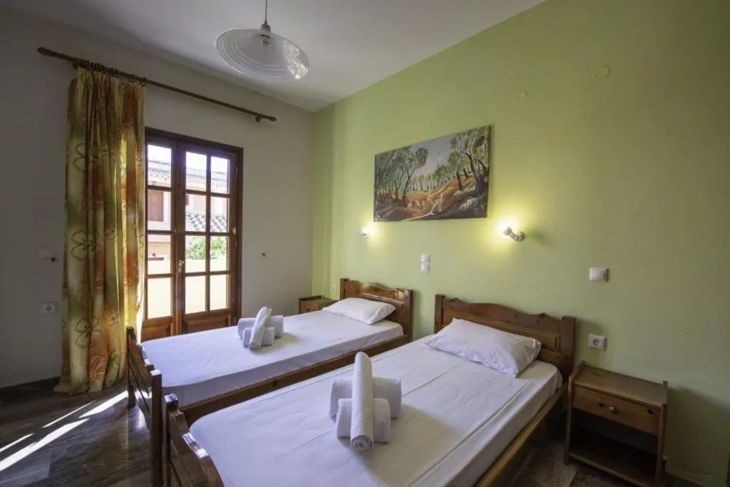 Bed in Miltiadis Apartments Spiti Miltiadis