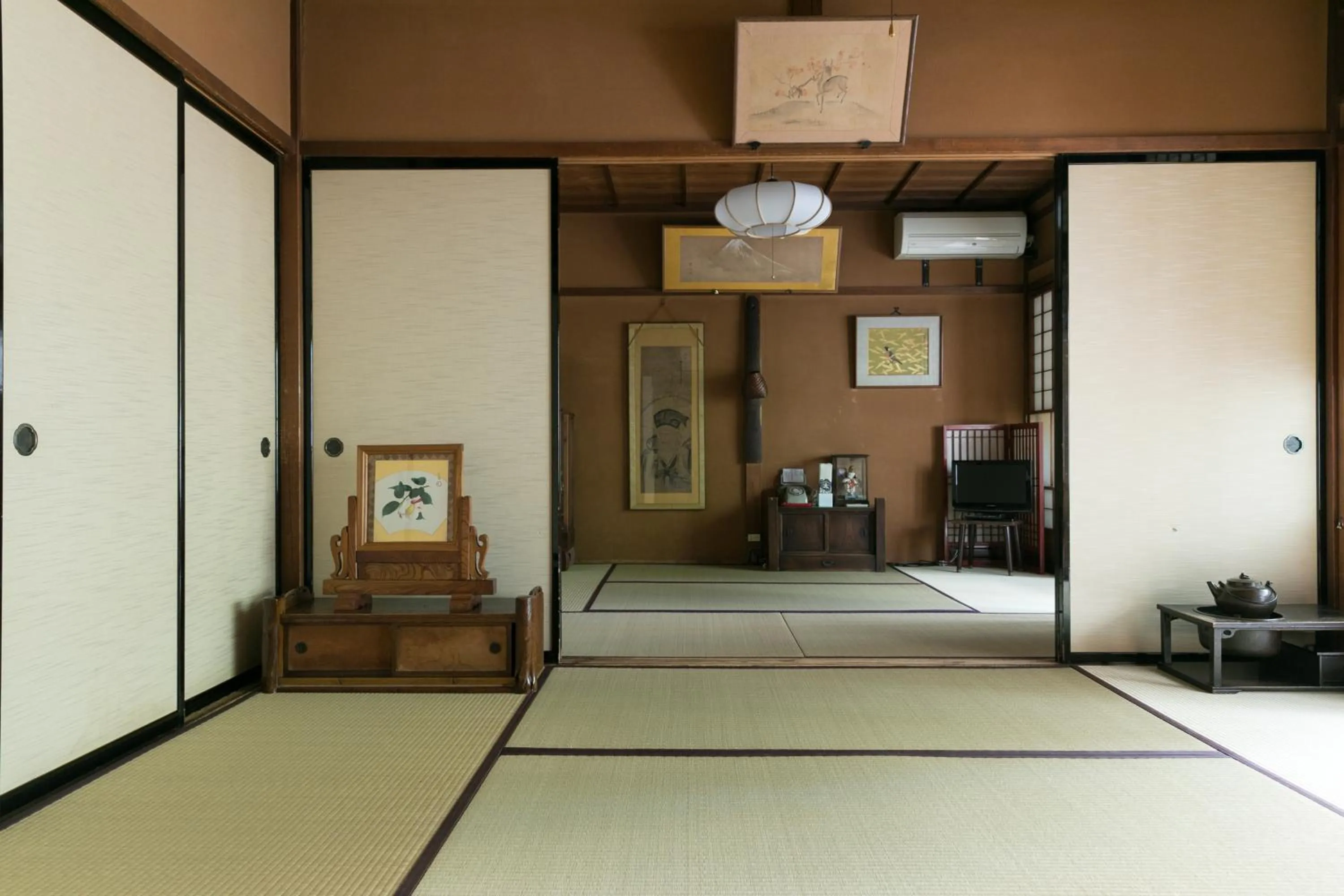 Photo of the whole room, Bed in Sumiyoshi Ryokan