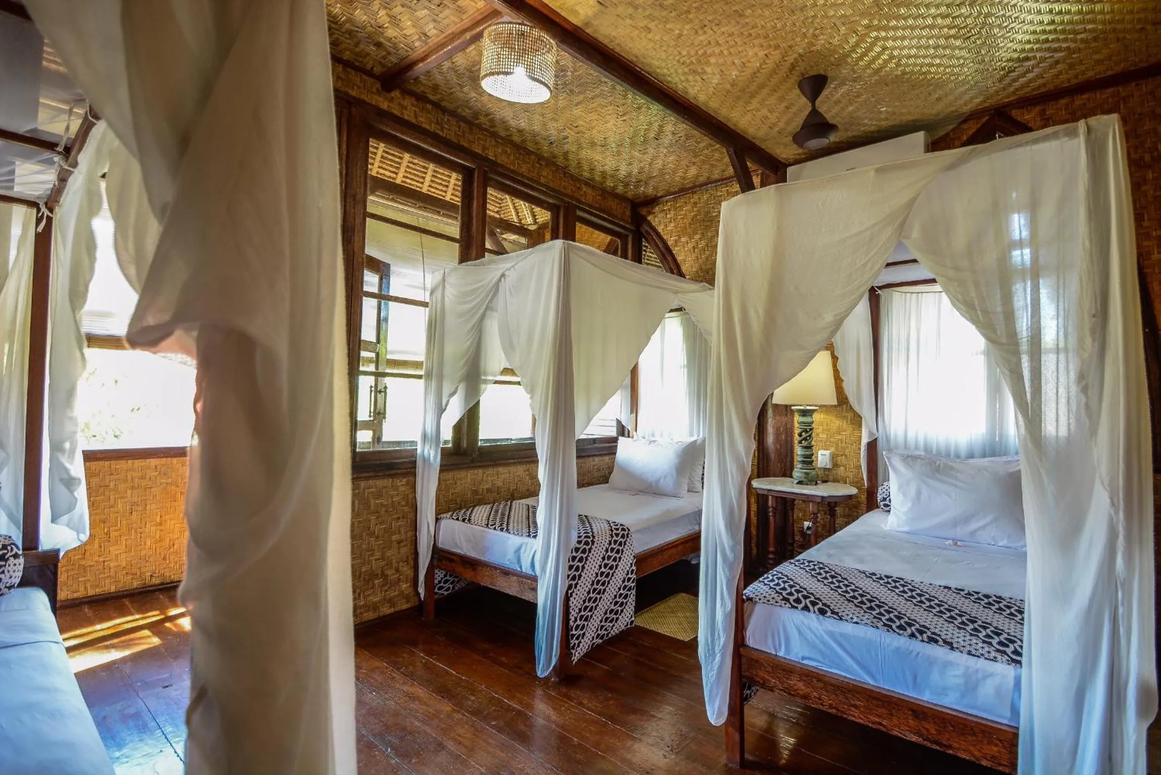 Bed in Aashaya Jasri Resort