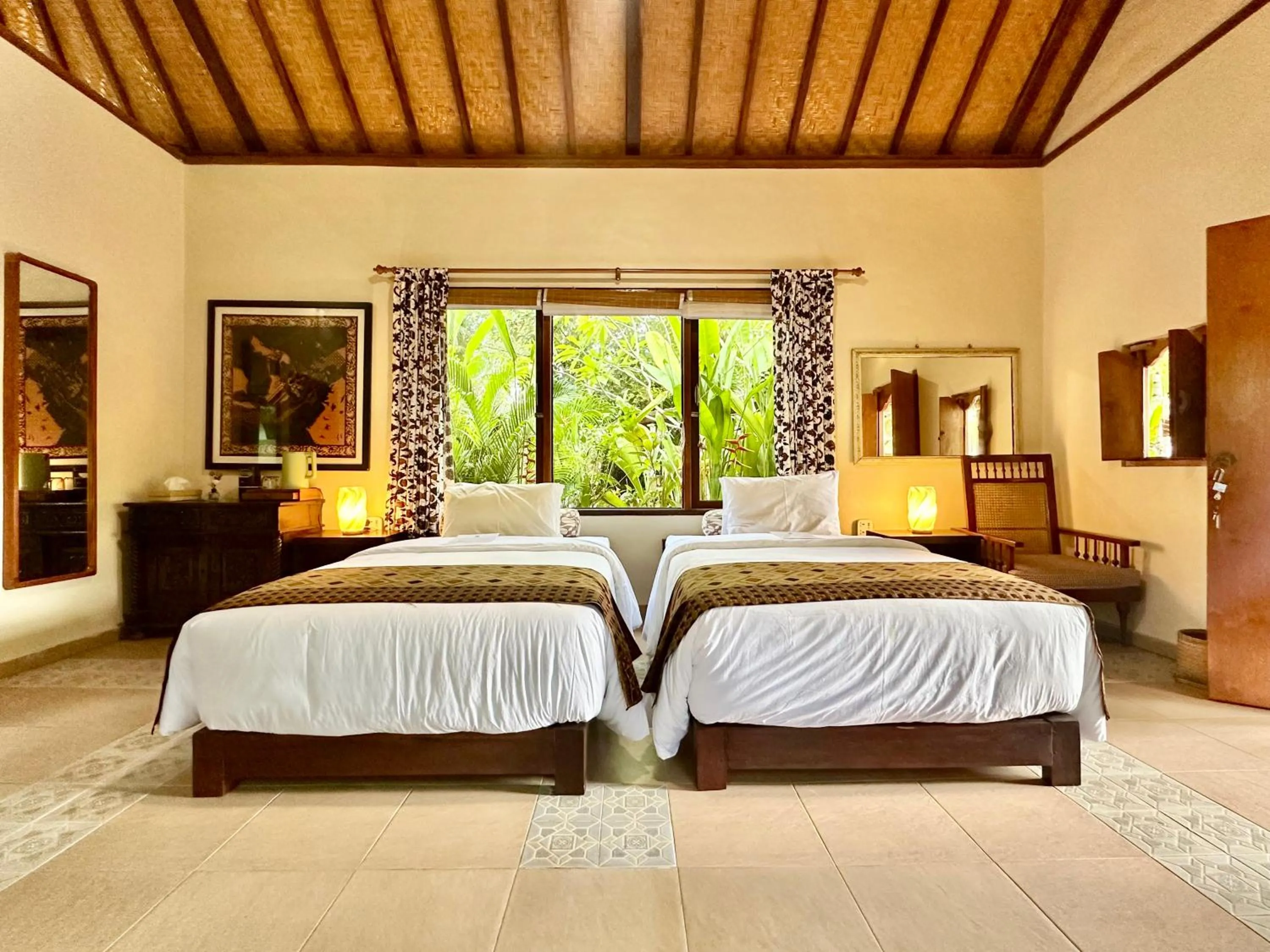 Bed in Aashaya Jasri Resort