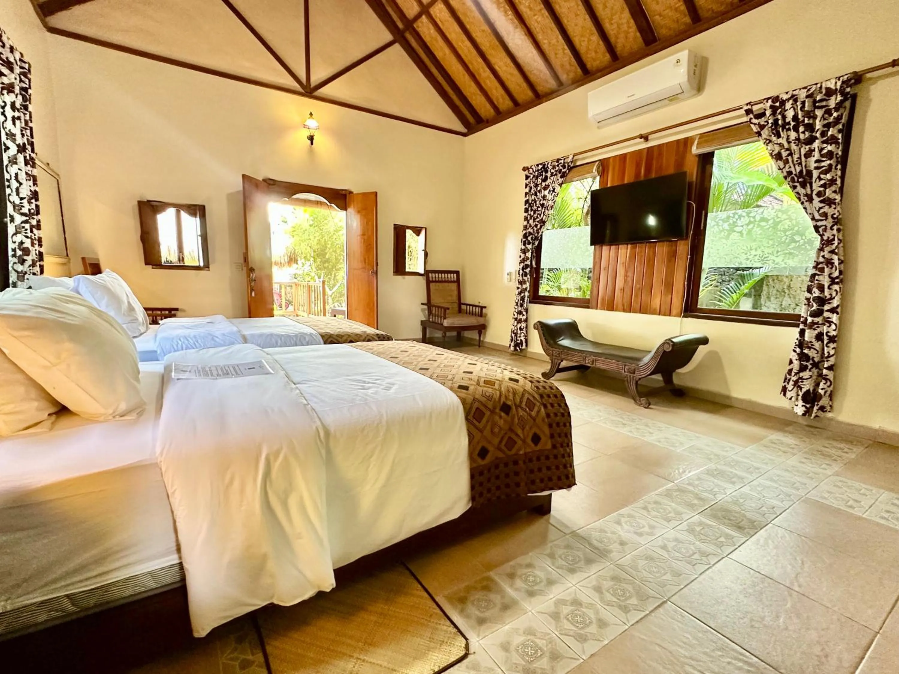 Bed in Aashaya Jasri Resort