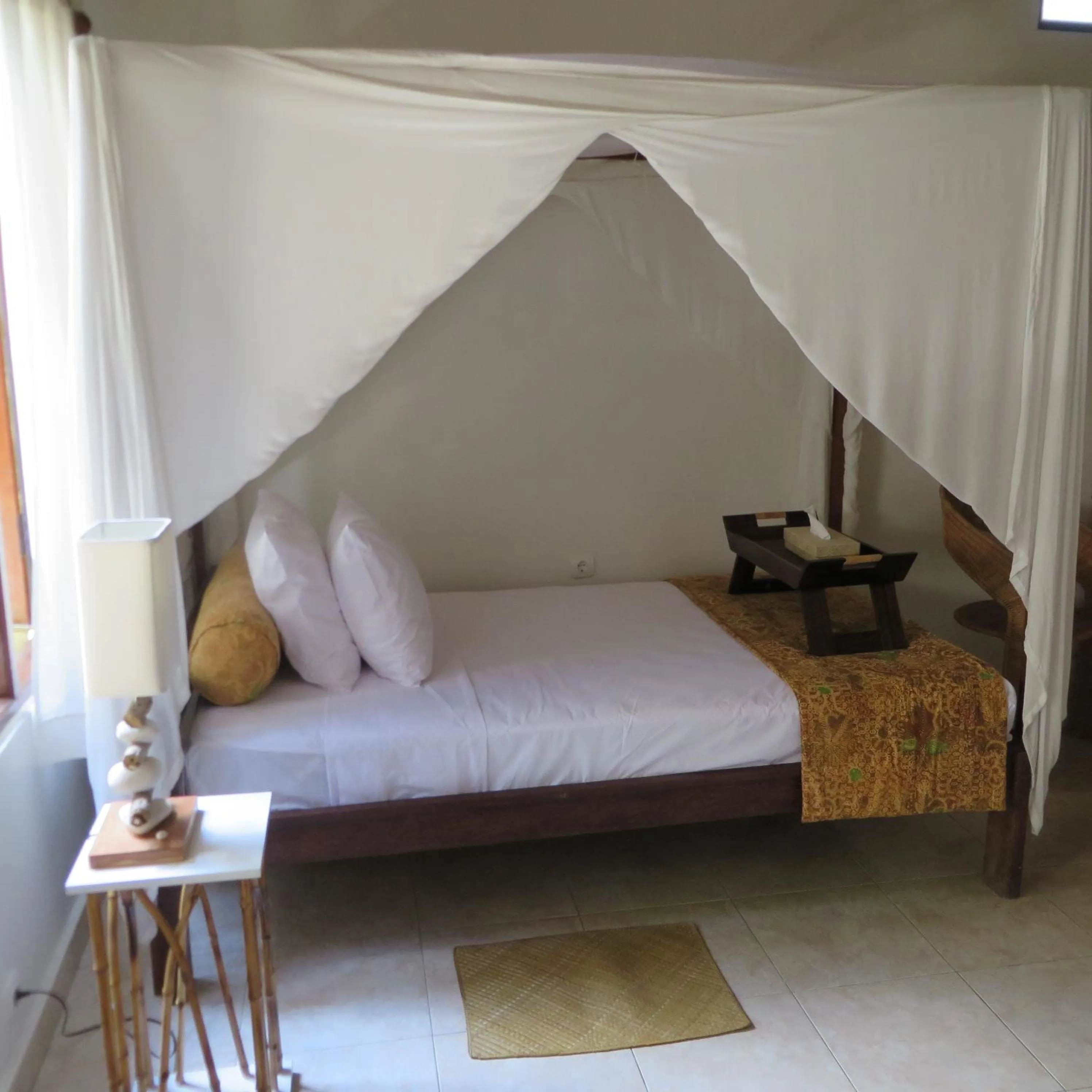 Bed in Aashaya Jasri Resort