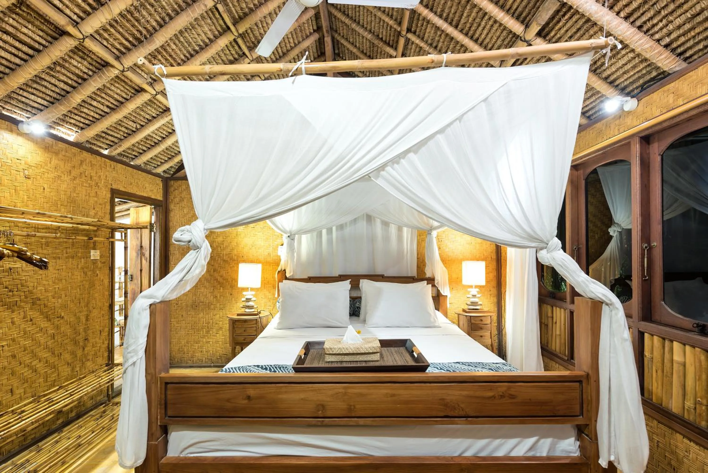 Bed in Aashaya Jasri Resort