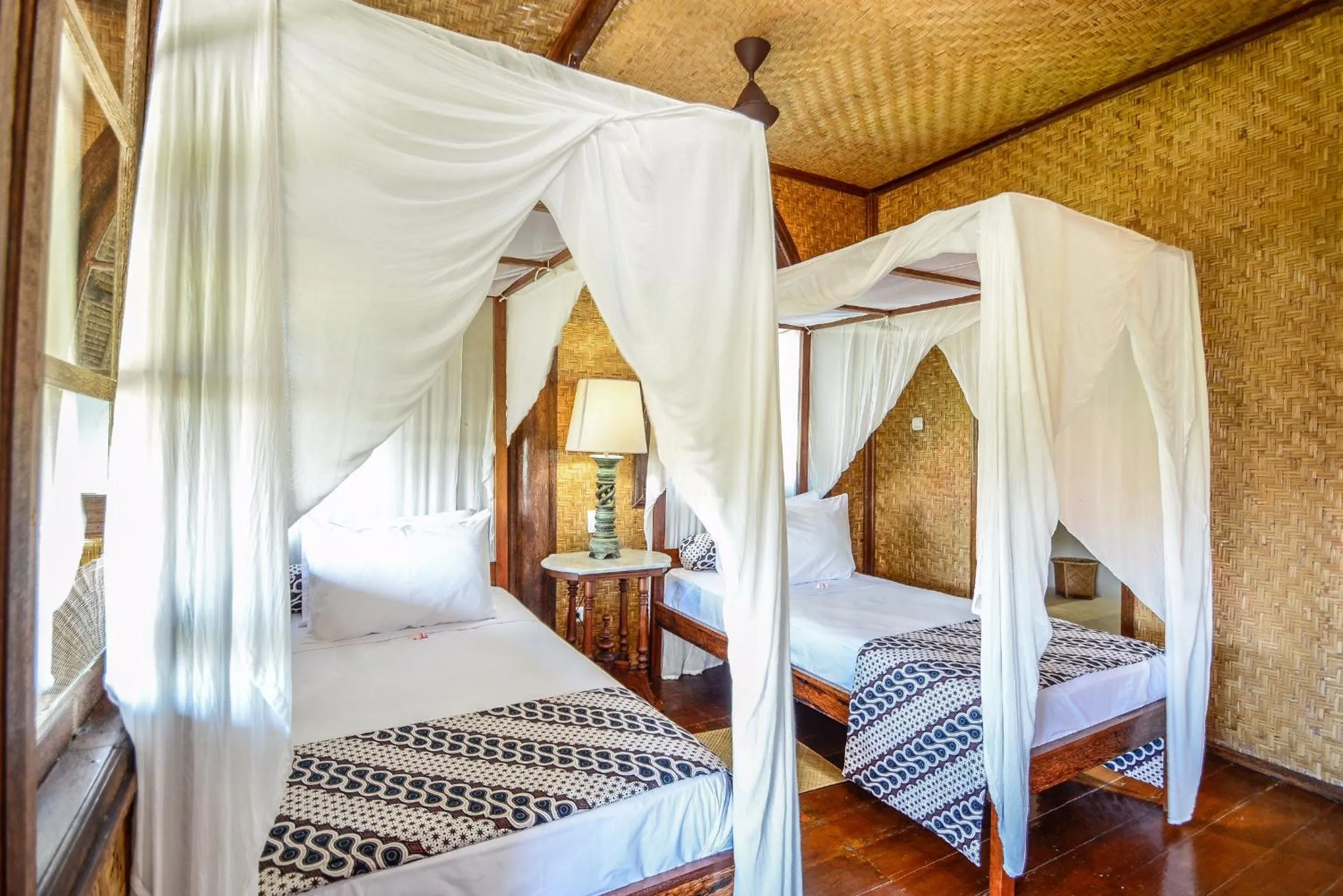 Bed in Aashaya Jasri Resort