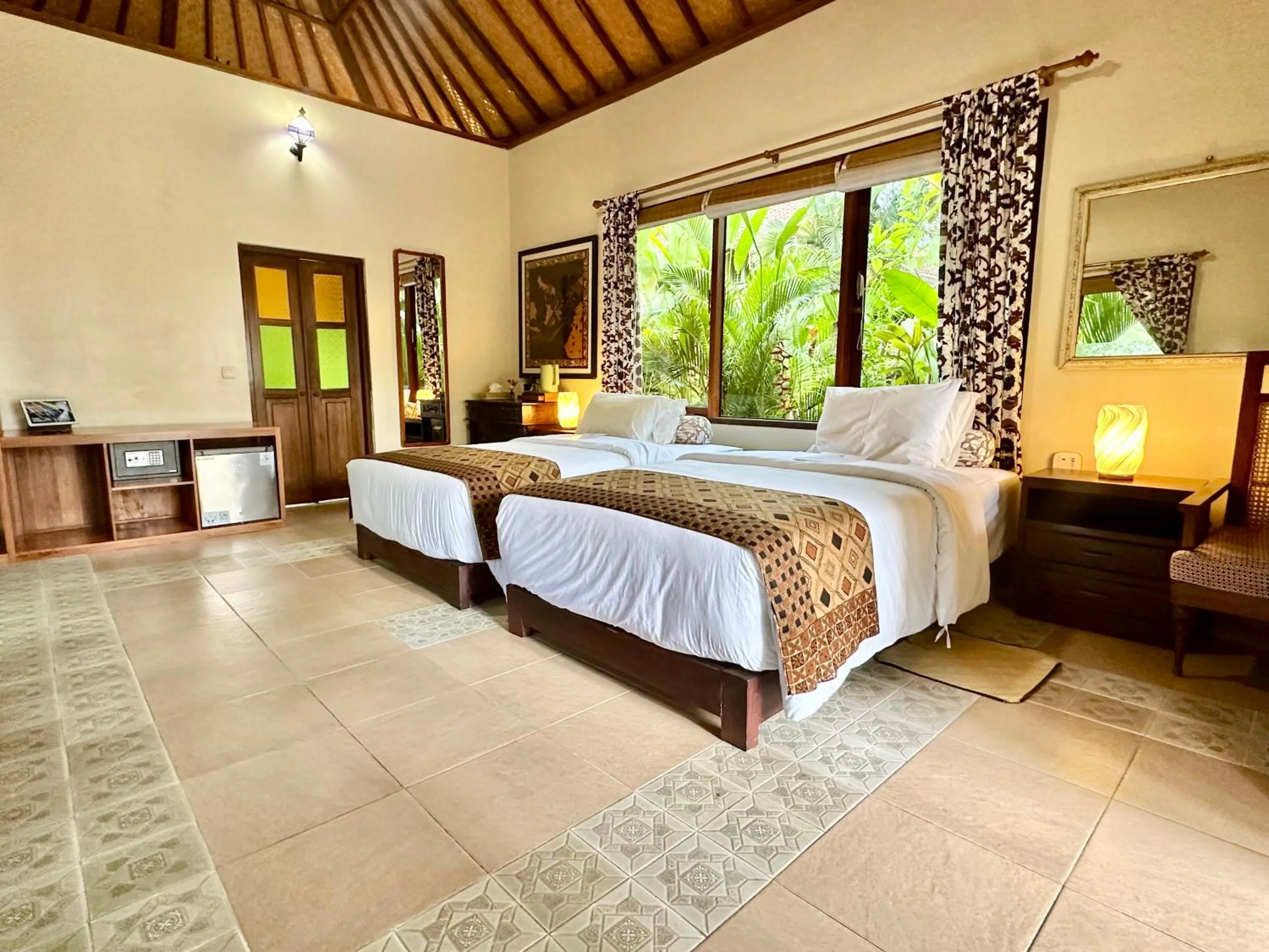 Bed in Aashaya Jasri Resort