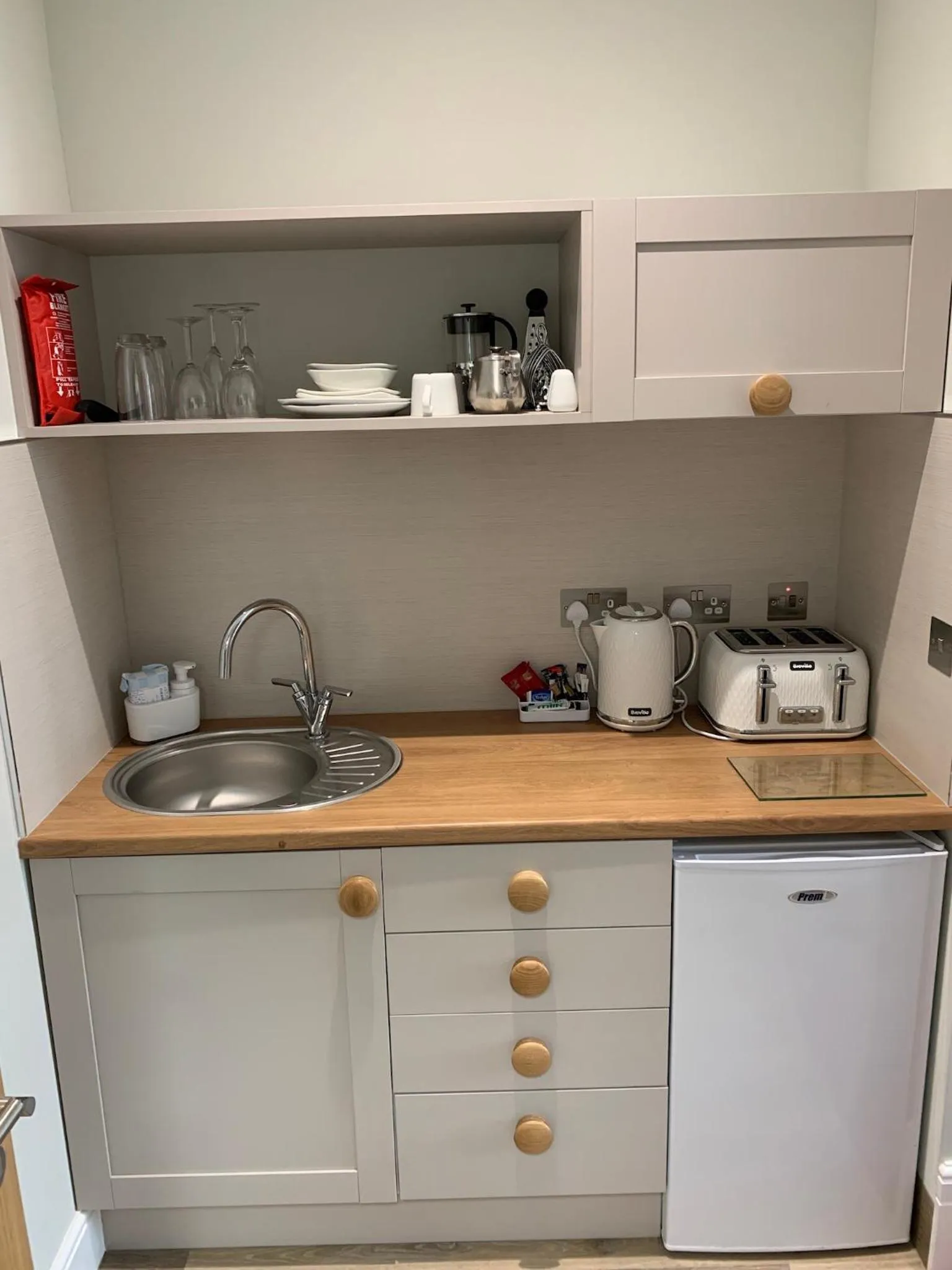 Kitchen or kitchenette in Harmony Apartments