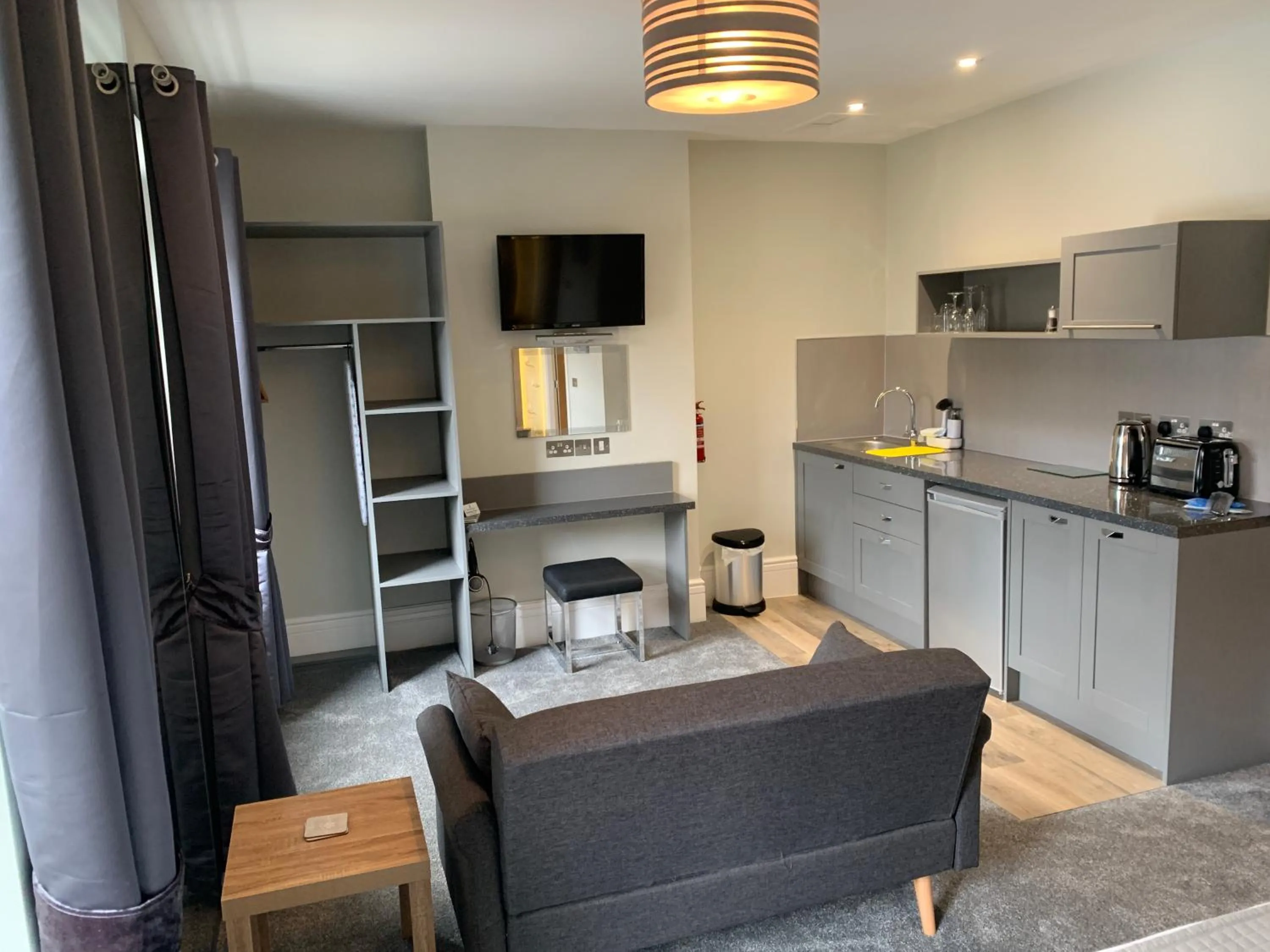 Kitchen or kitchenette in Harmony Apartments