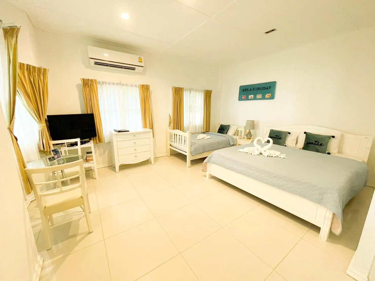 Bed in Vongdeuan Resort