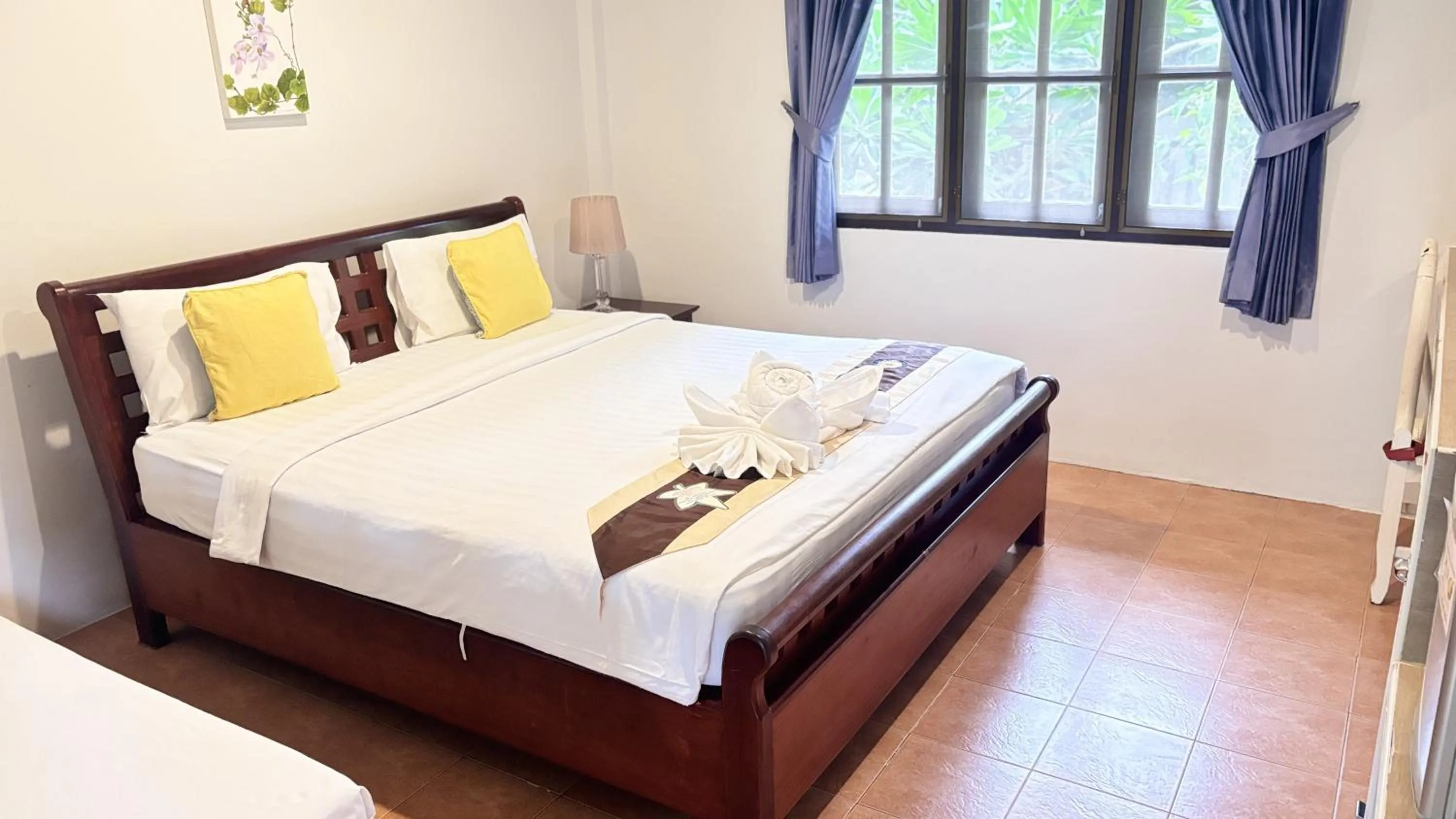 Bed in Vongdeuan Resort