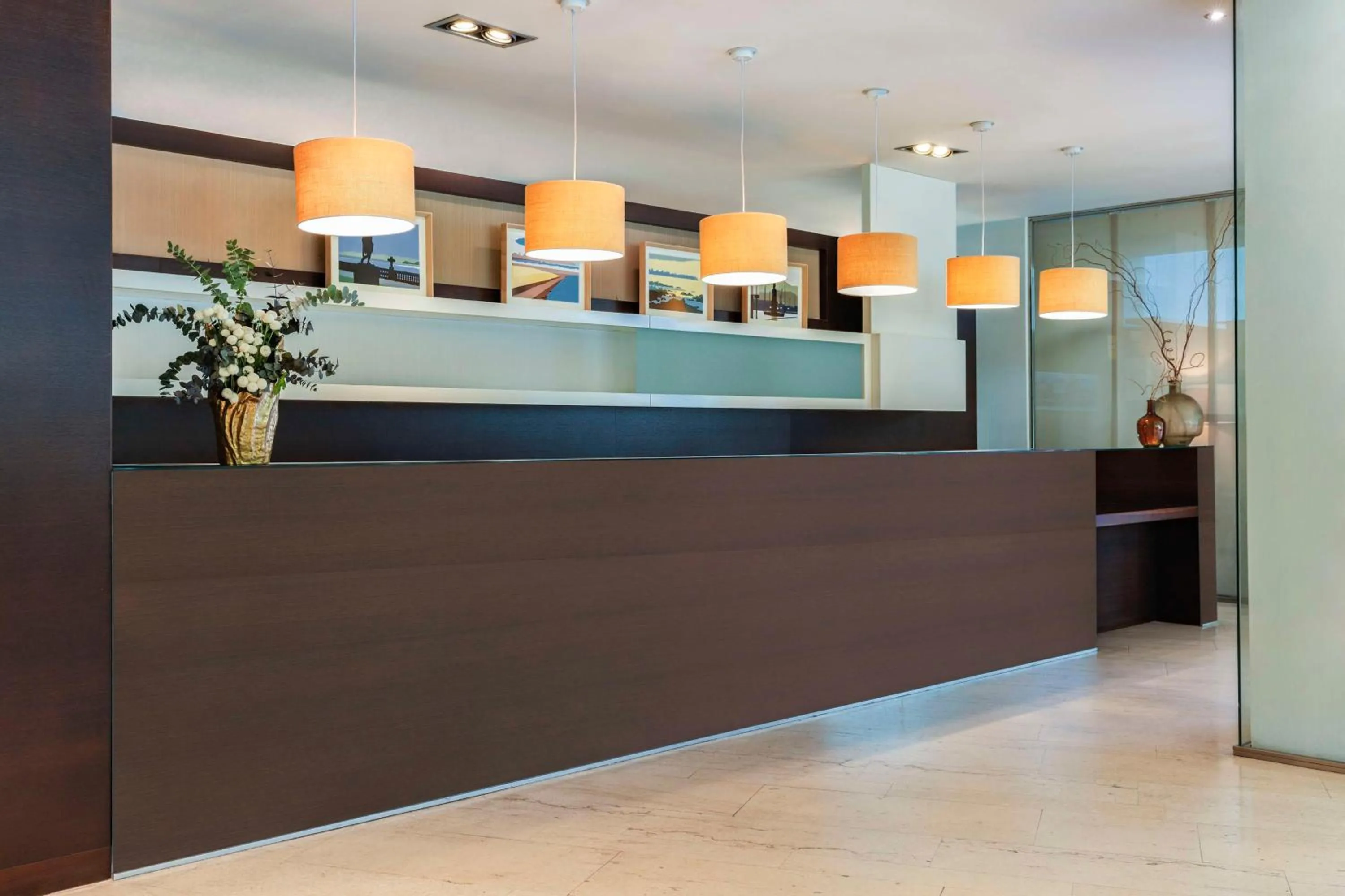 Lobby or reception in NH Gijón