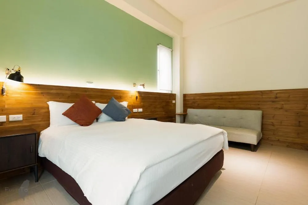 Bed in 沉靛旅宿 La Casa Indaco 墾丁夢幻島Villa