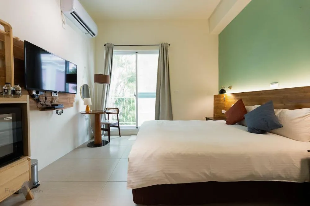 Bed in 沉靛旅宿 La Casa Indaco 墾丁夢幻島Villa