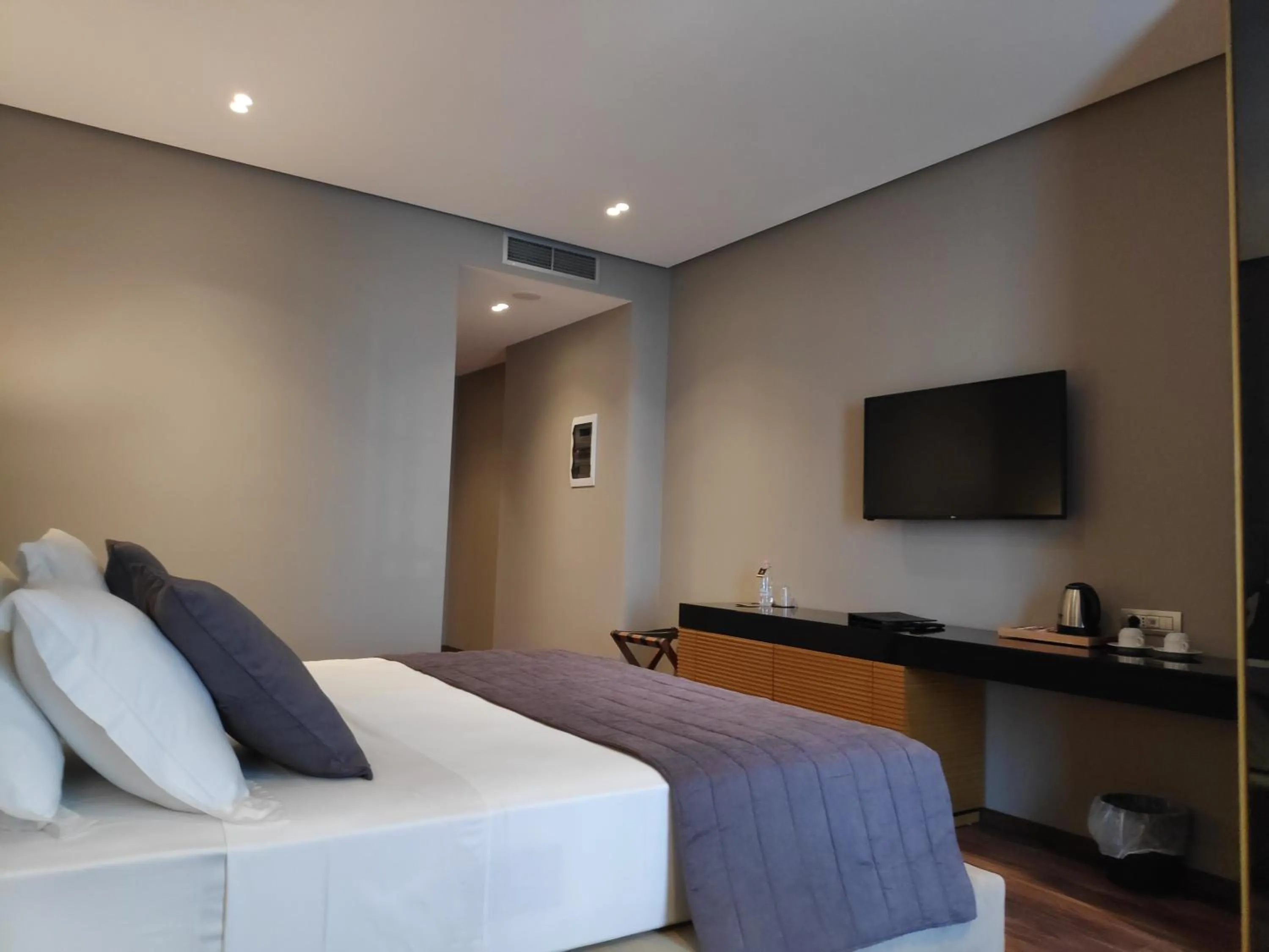 Bed in Supreme Hotel