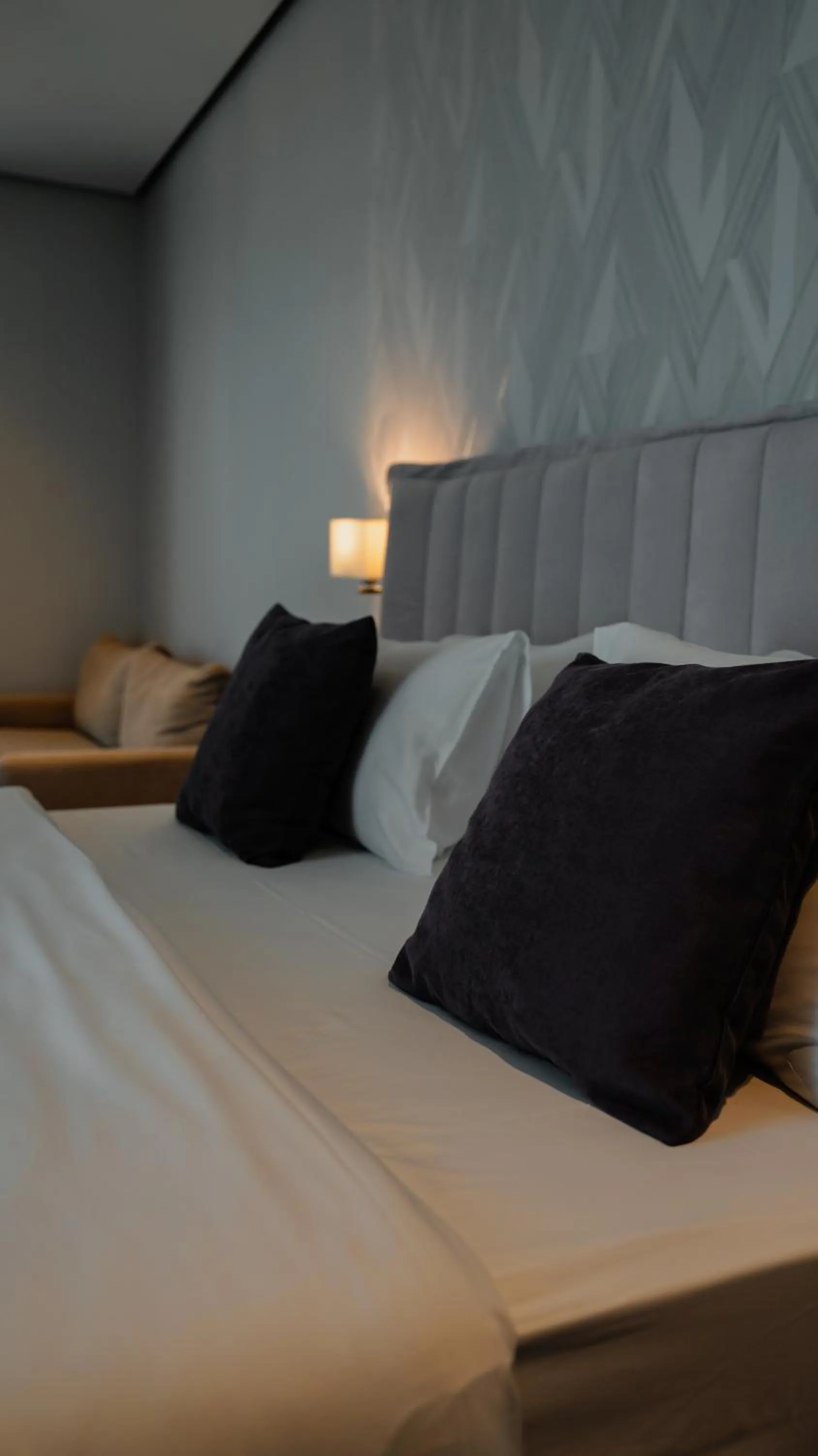 Bed in Supreme Hotel