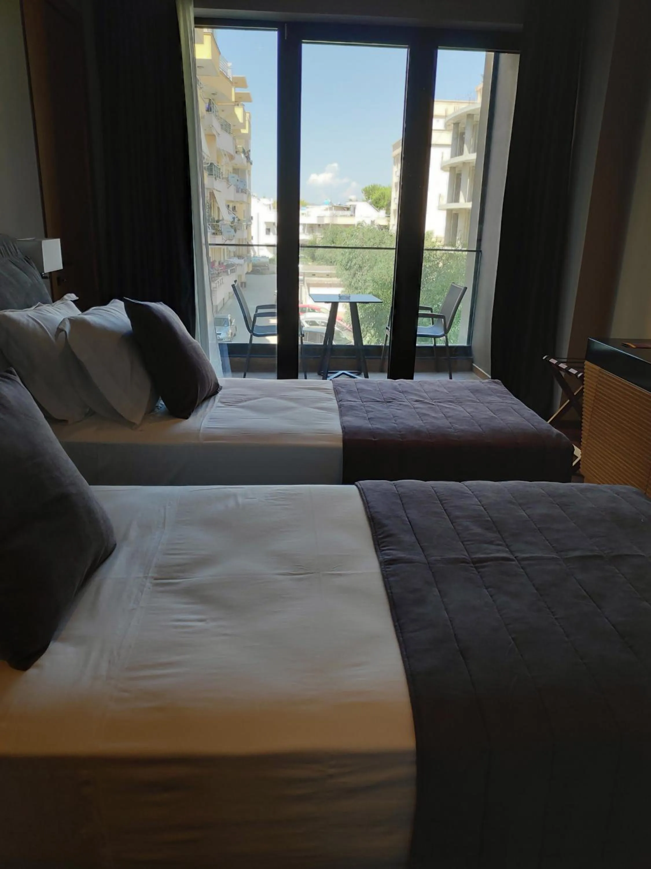 Inner courtyard view, Bed in Supreme Hotel