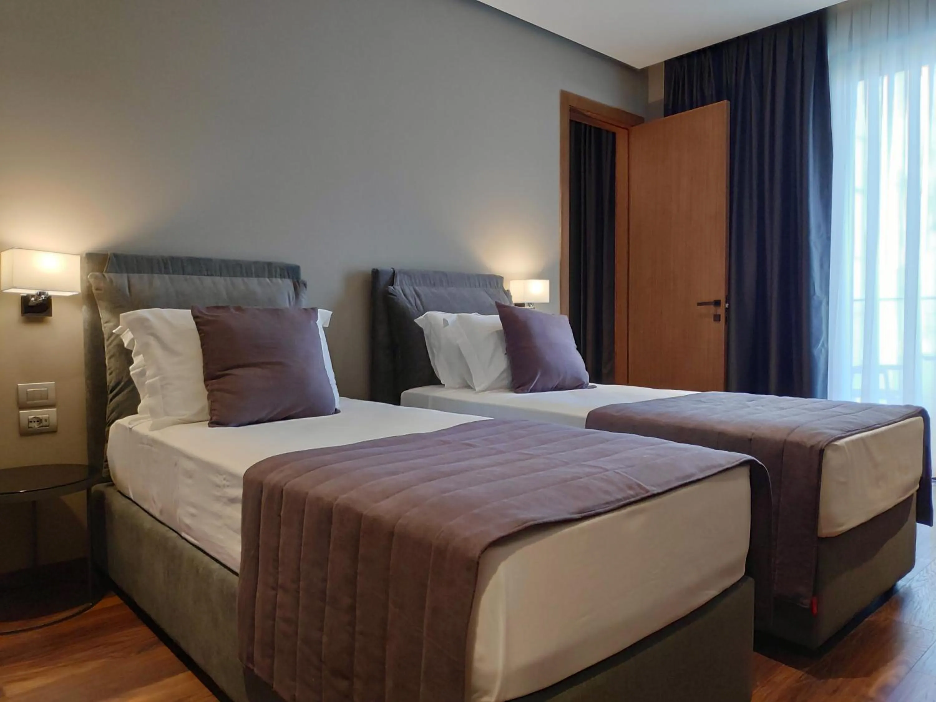 Bed in Supreme Hotel