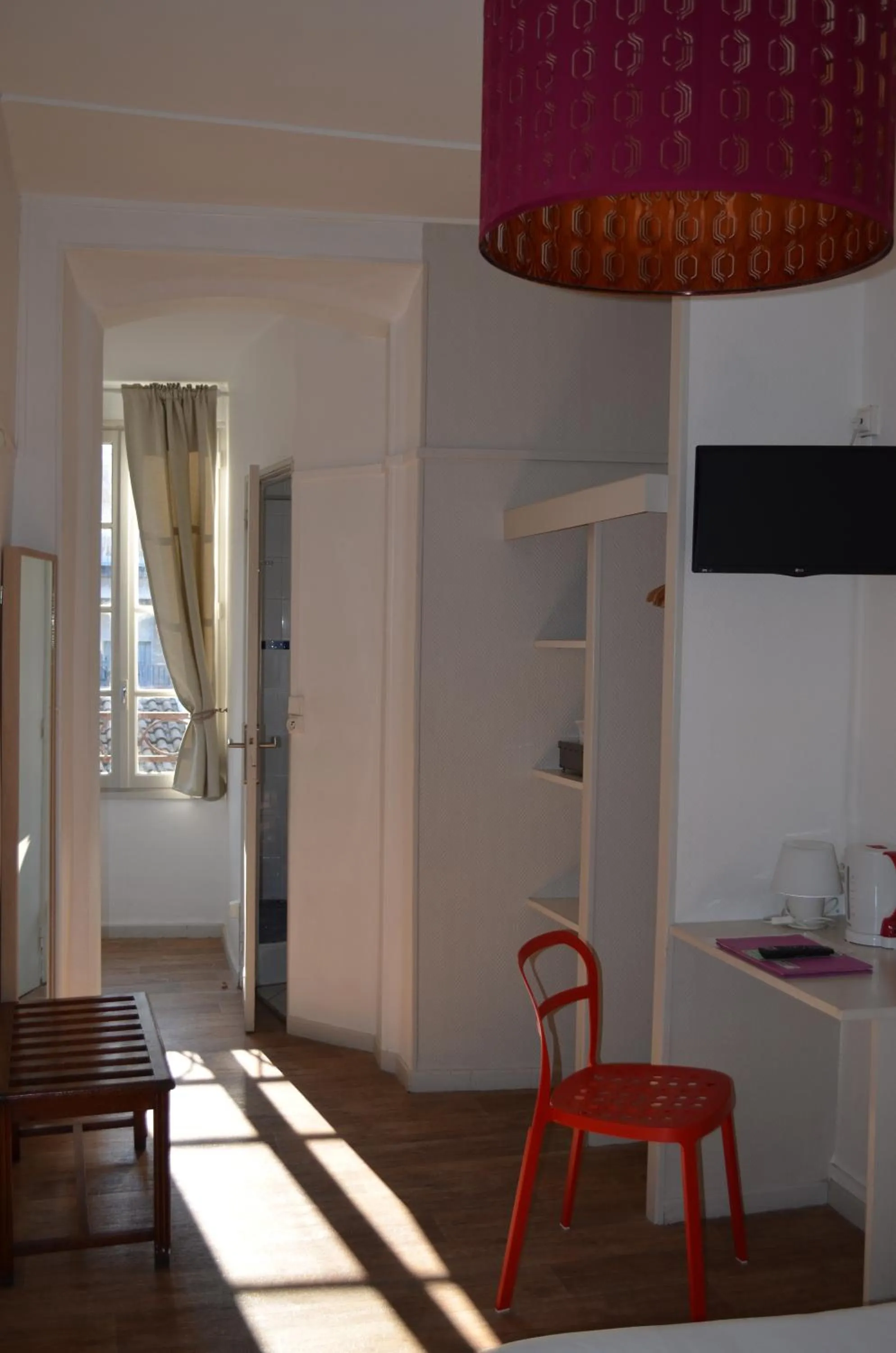 Bedroom in Hôtel Les Corps Saints