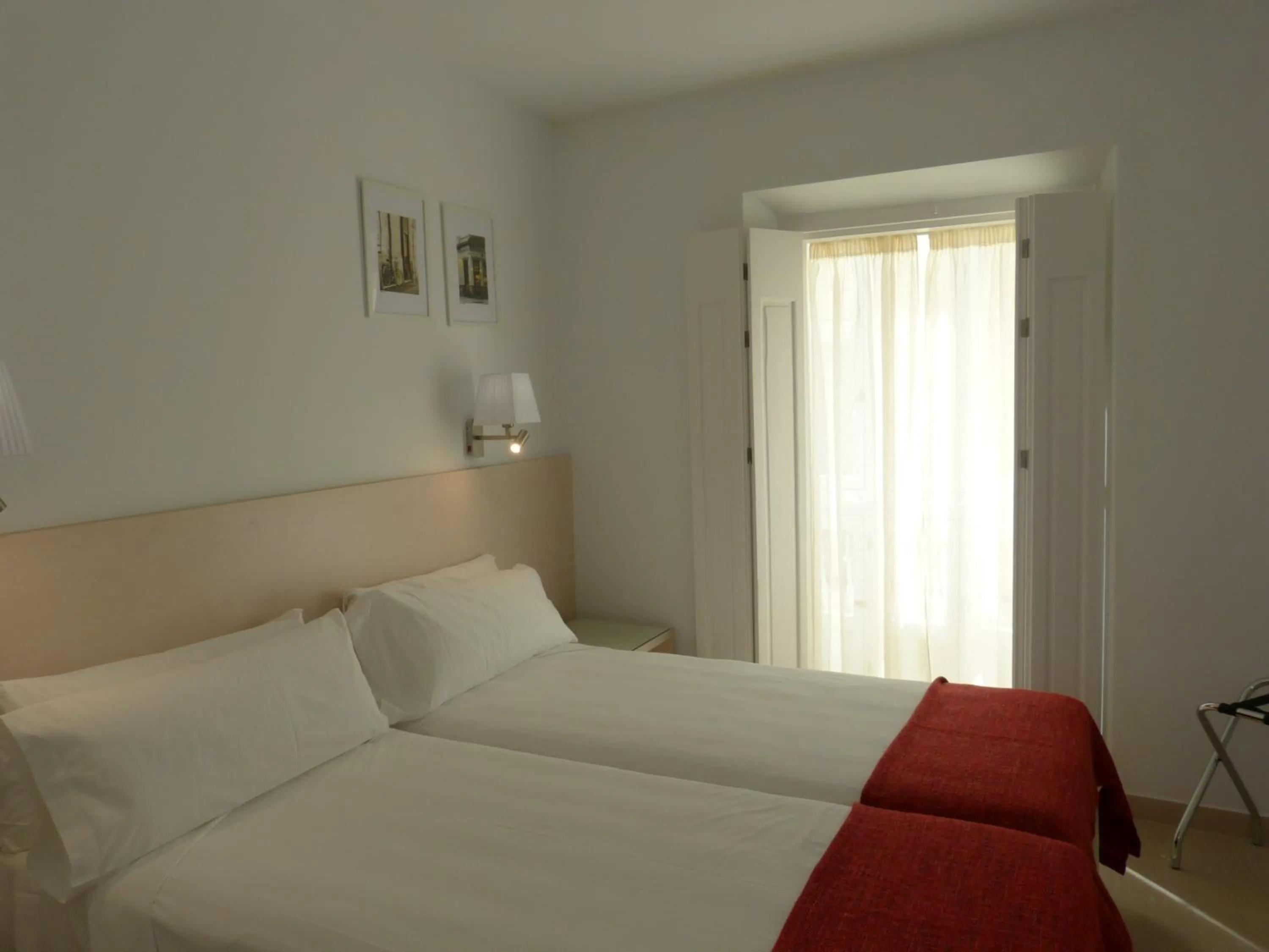 Bed in Apartamentos Patagonia Sur