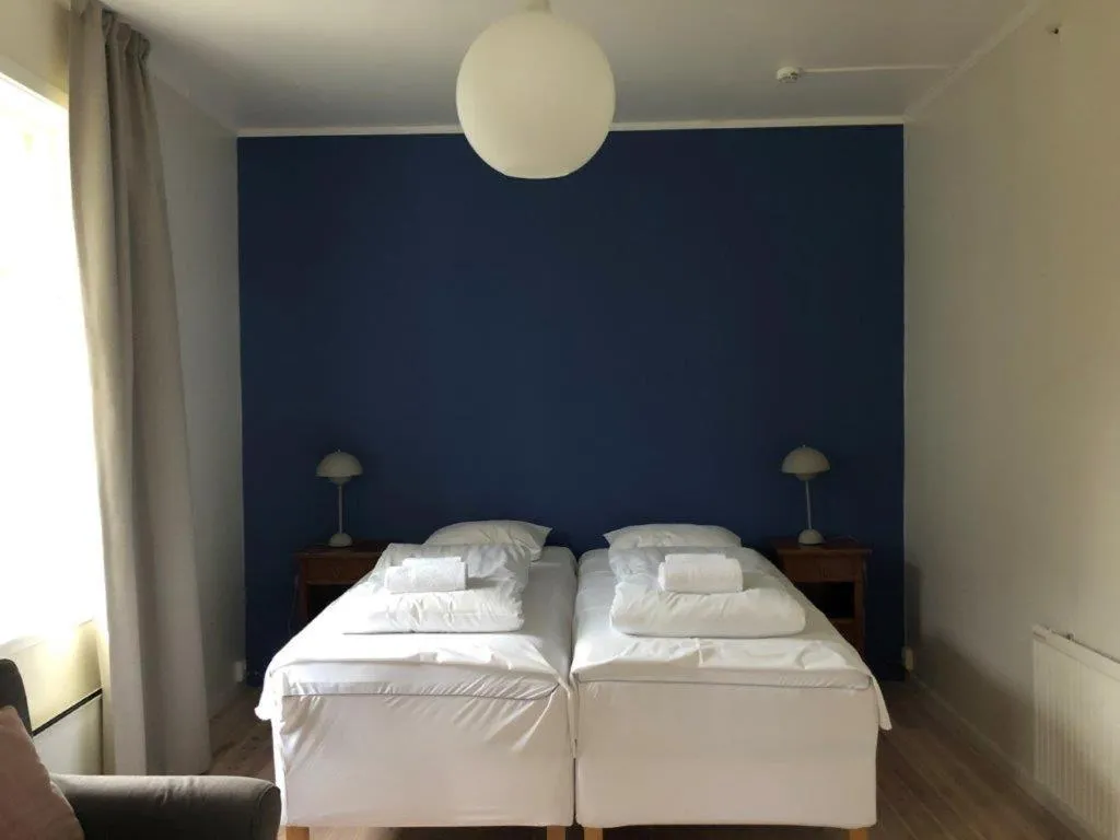 Photo of the whole room, Bed in Lindstrøm Hotel