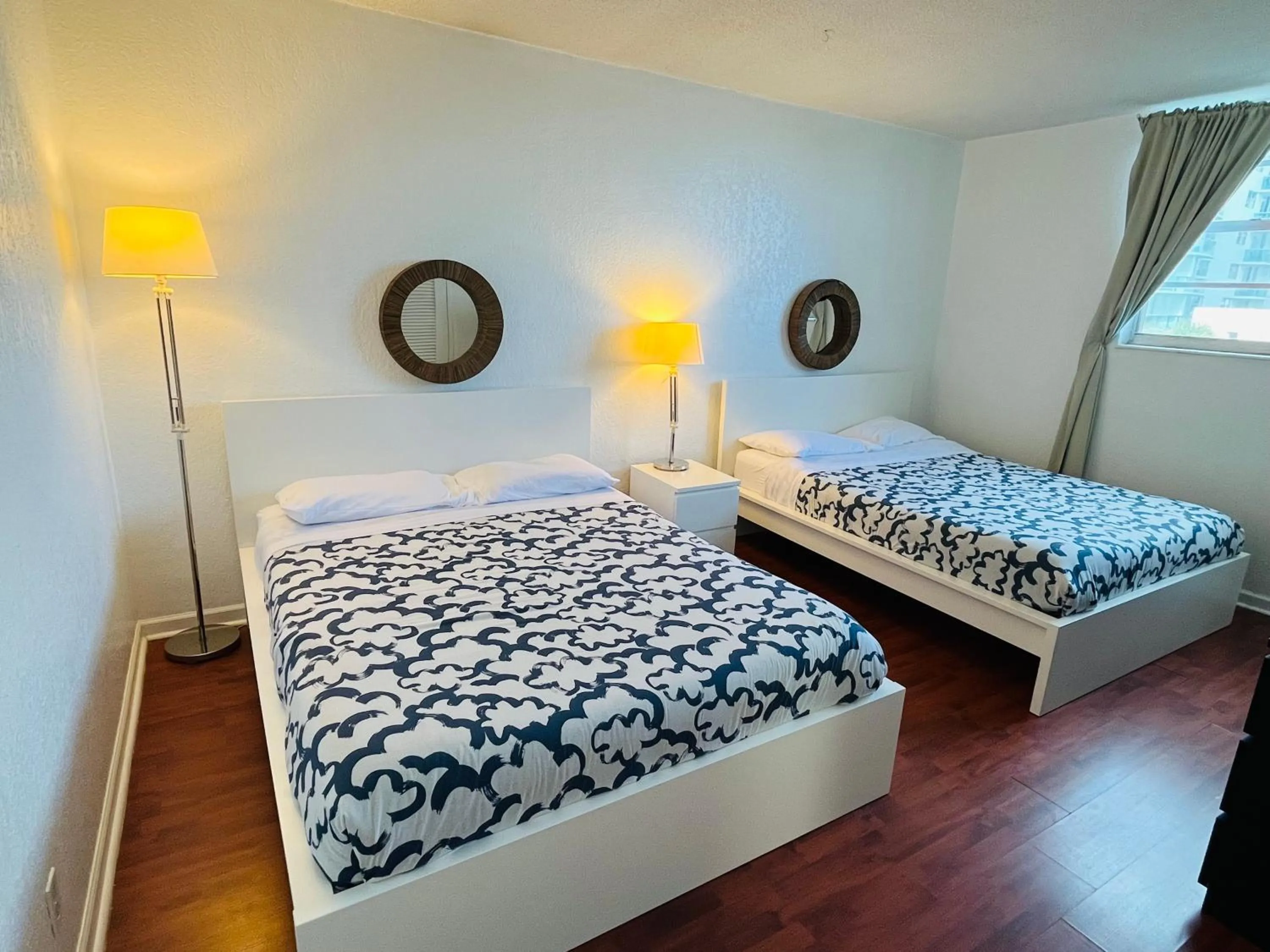 Bed in Hallandale Condo, Partial Ocean View Direct Beach and Pool Access Hollywood Beach