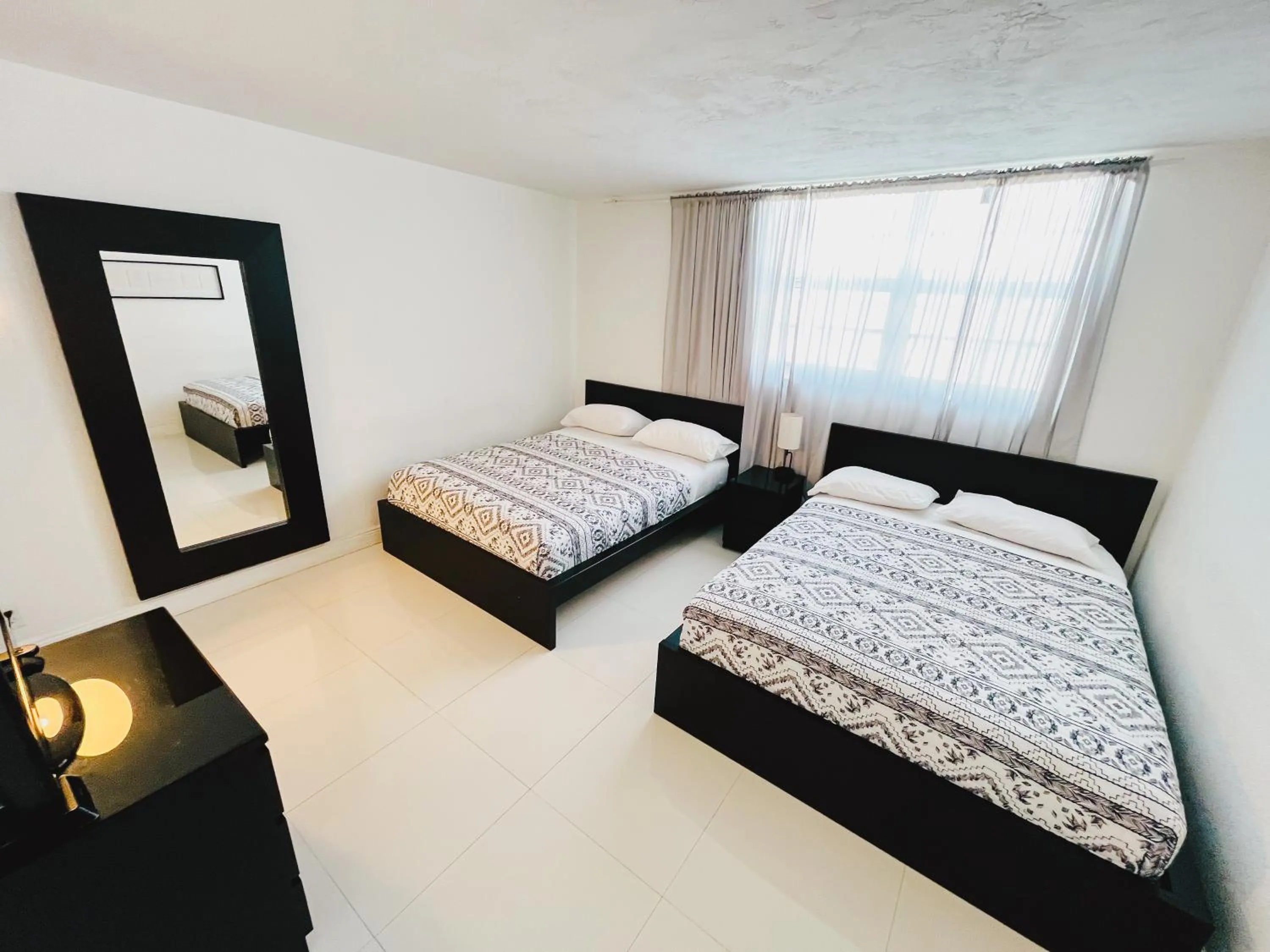 Bed in Hallandale Condo, Partial Ocean View Direct Beach and Pool Access Hollywood Beach