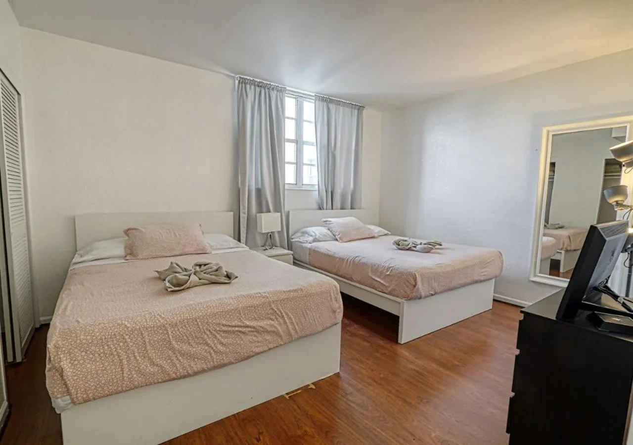 Bed in Hallandale Condo, Partial Ocean View Direct Beach and Pool Access Hollywood Beach