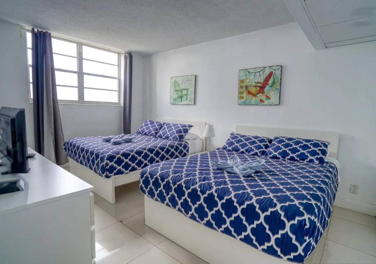 Bed in Hallandale Condo, Partial Ocean View Direct Beach and Pool Access Hollywood Beach