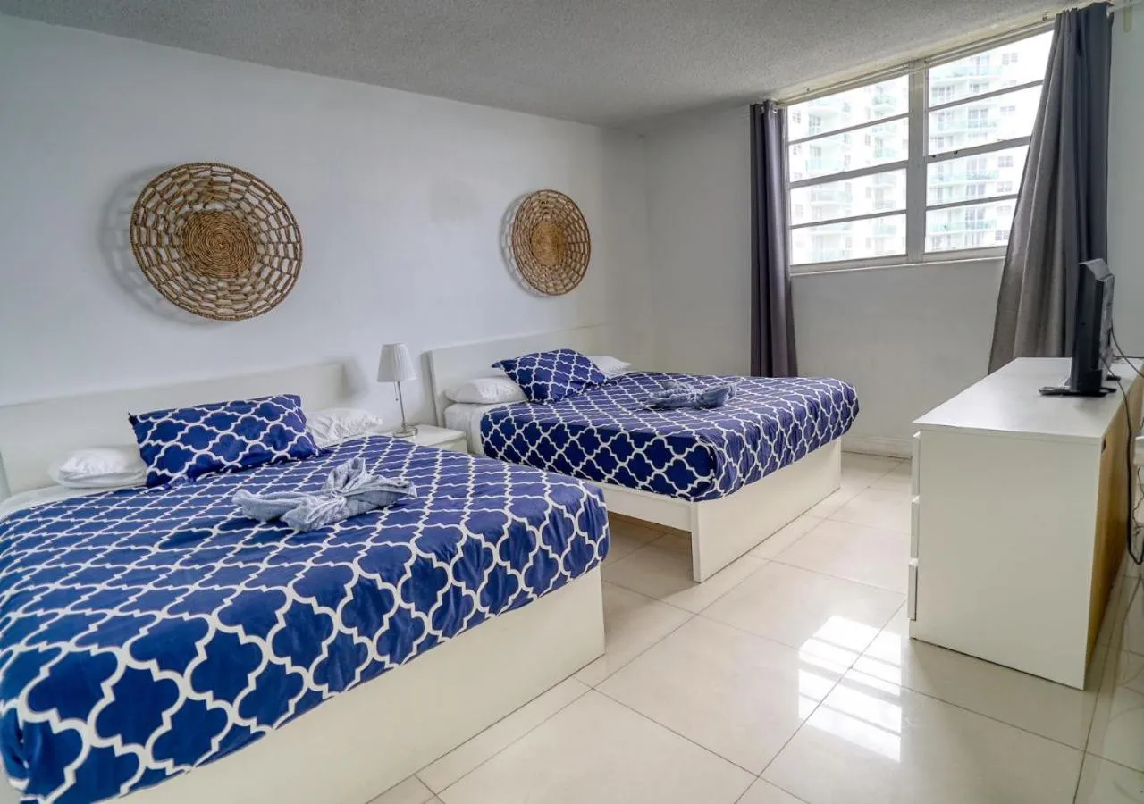 Bed in Hallandale Condo, Partial Ocean View Direct Beach and Pool Access Hollywood Beach