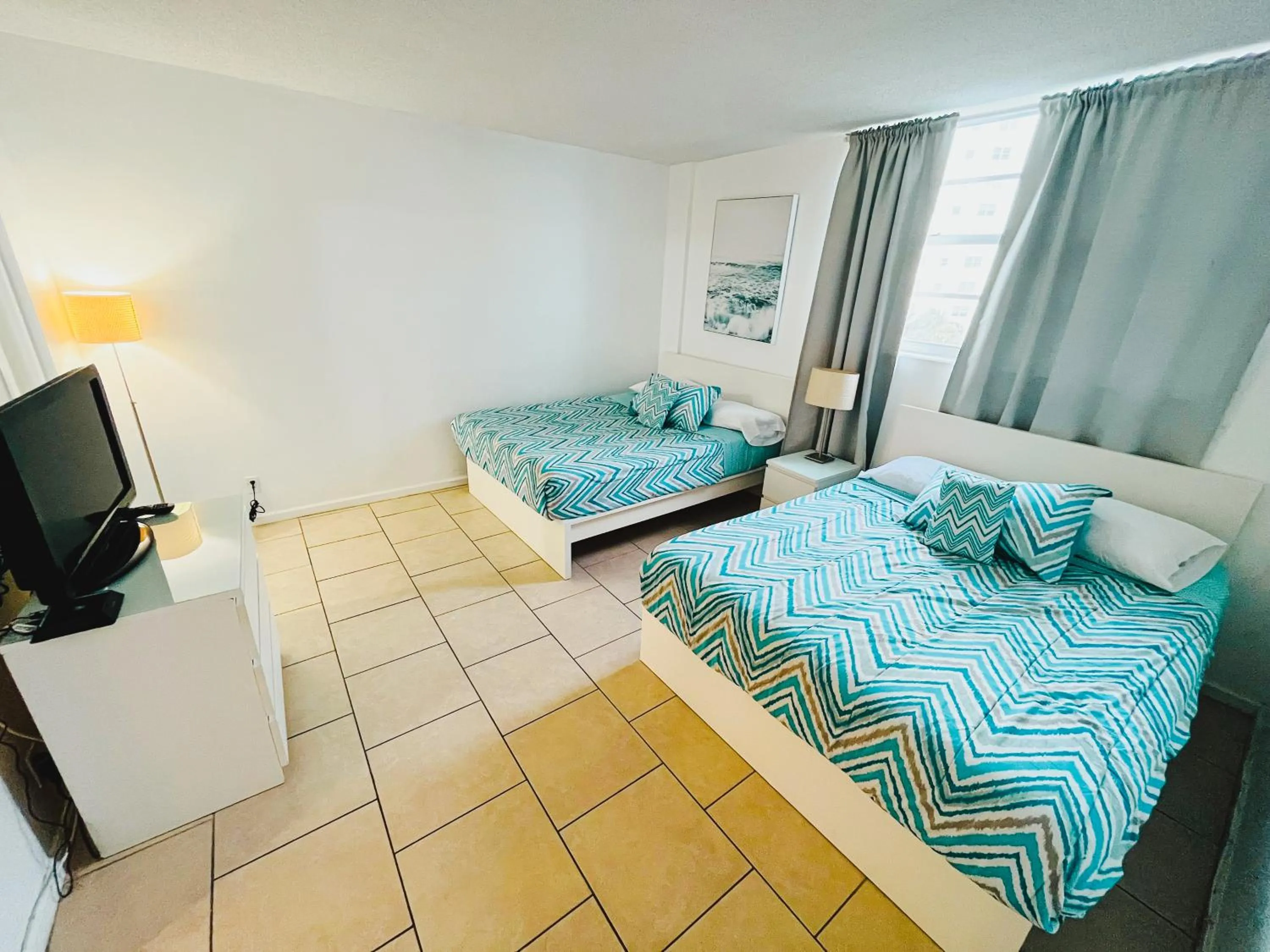 Bed in Hallandale Condo, Partial Ocean View Direct Beach and Pool Access Hollywood Beach