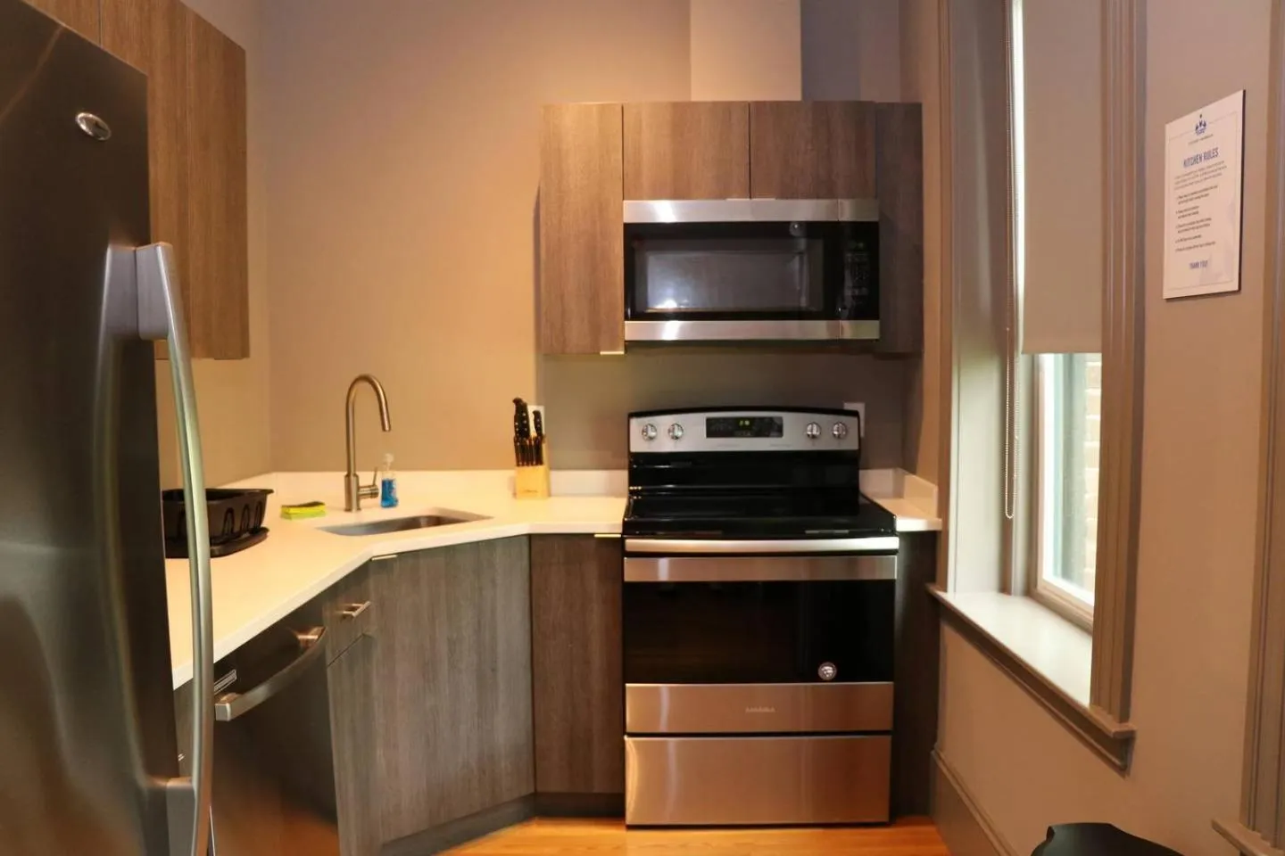 Communal kitchen in A Stylish Stay w/ a Queen Bed, Heated Floors.. #35