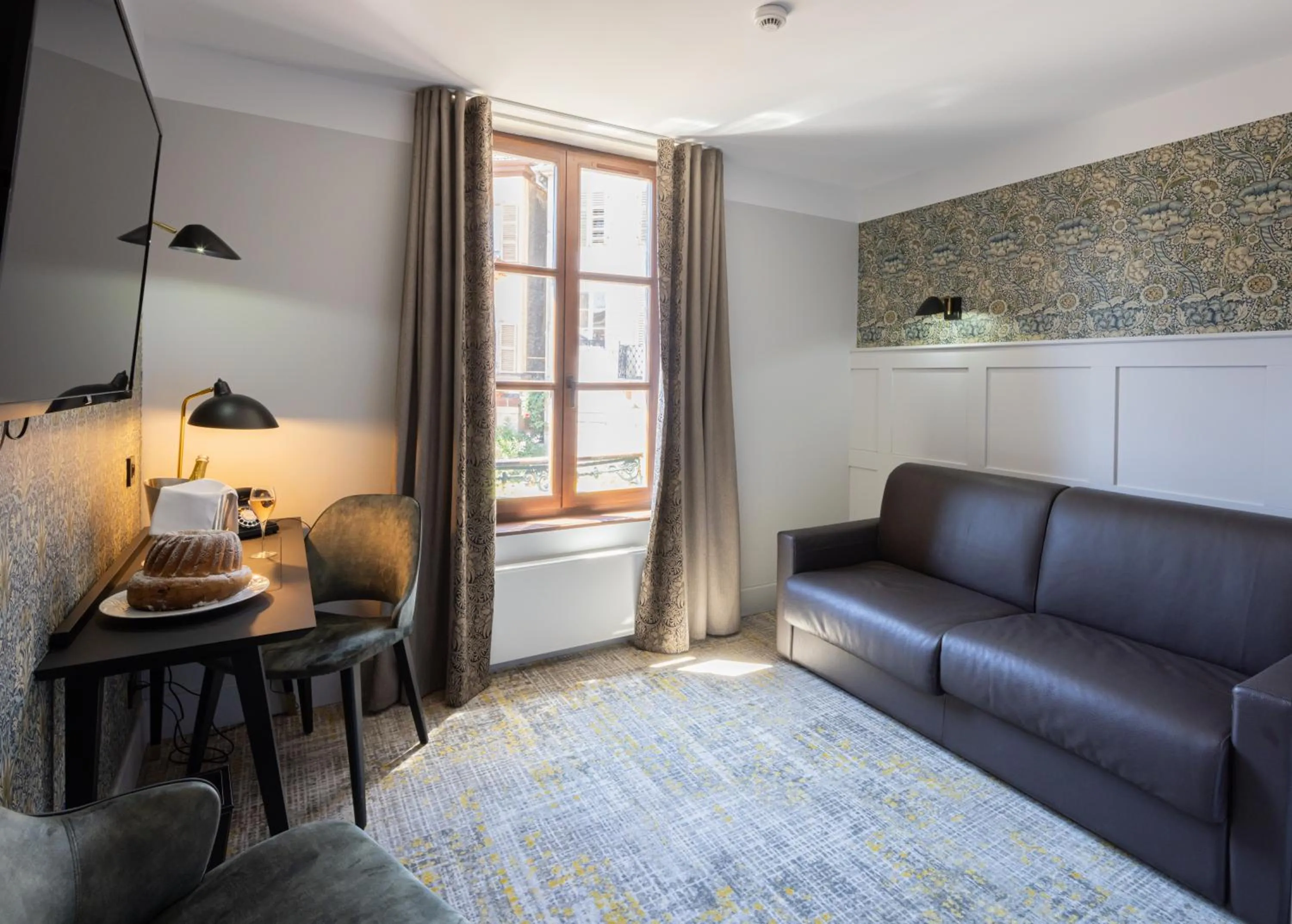 Living room in Logis Hôtel-Restaurant du Mouton