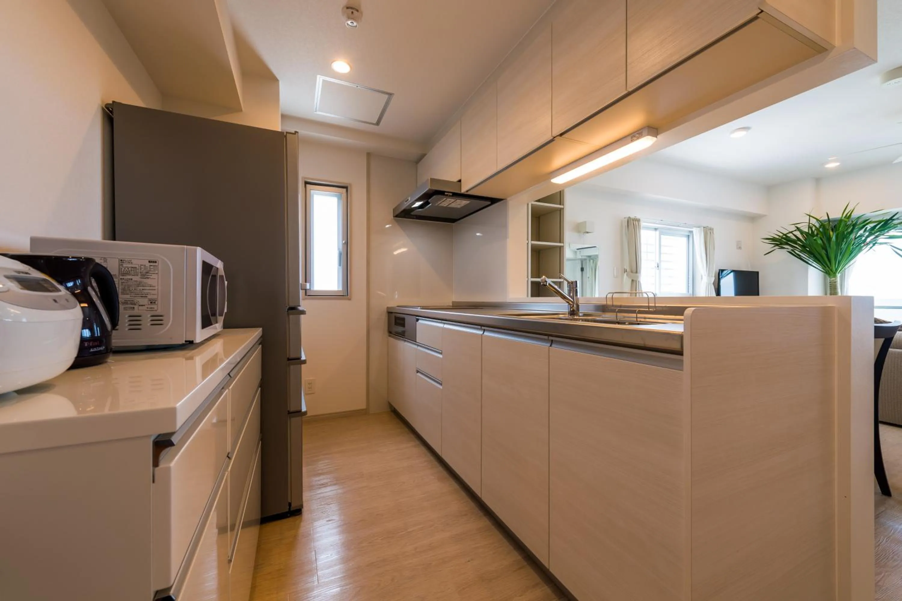 Kitchen or kitchenette in MINATO Chatan Seaside Condominium