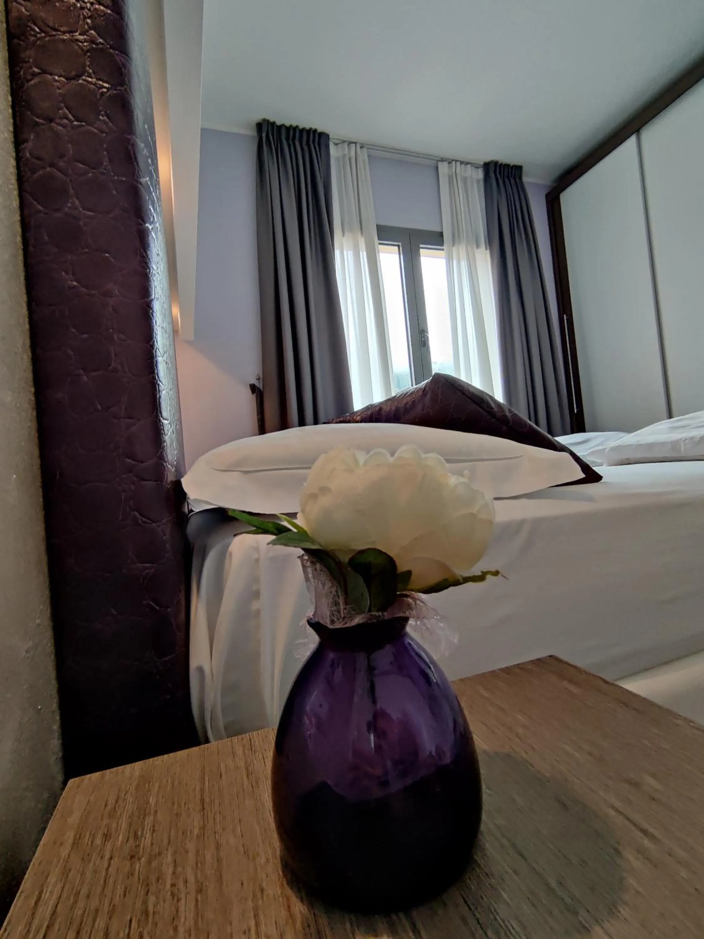 Decorative detail, Bed in Gardesana Active Apartments