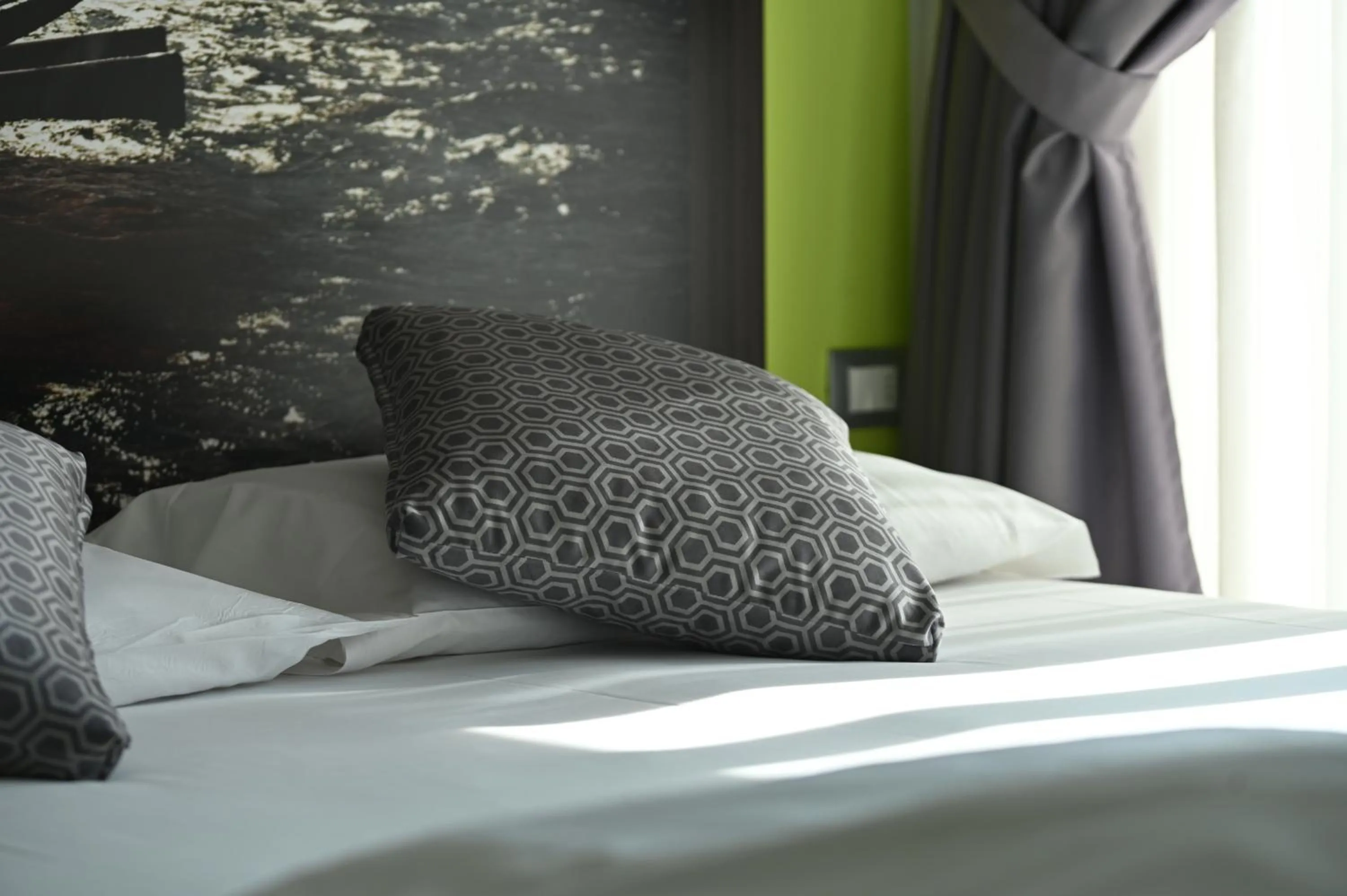 Decorative detail, Bed in Gardesana Active Apartments