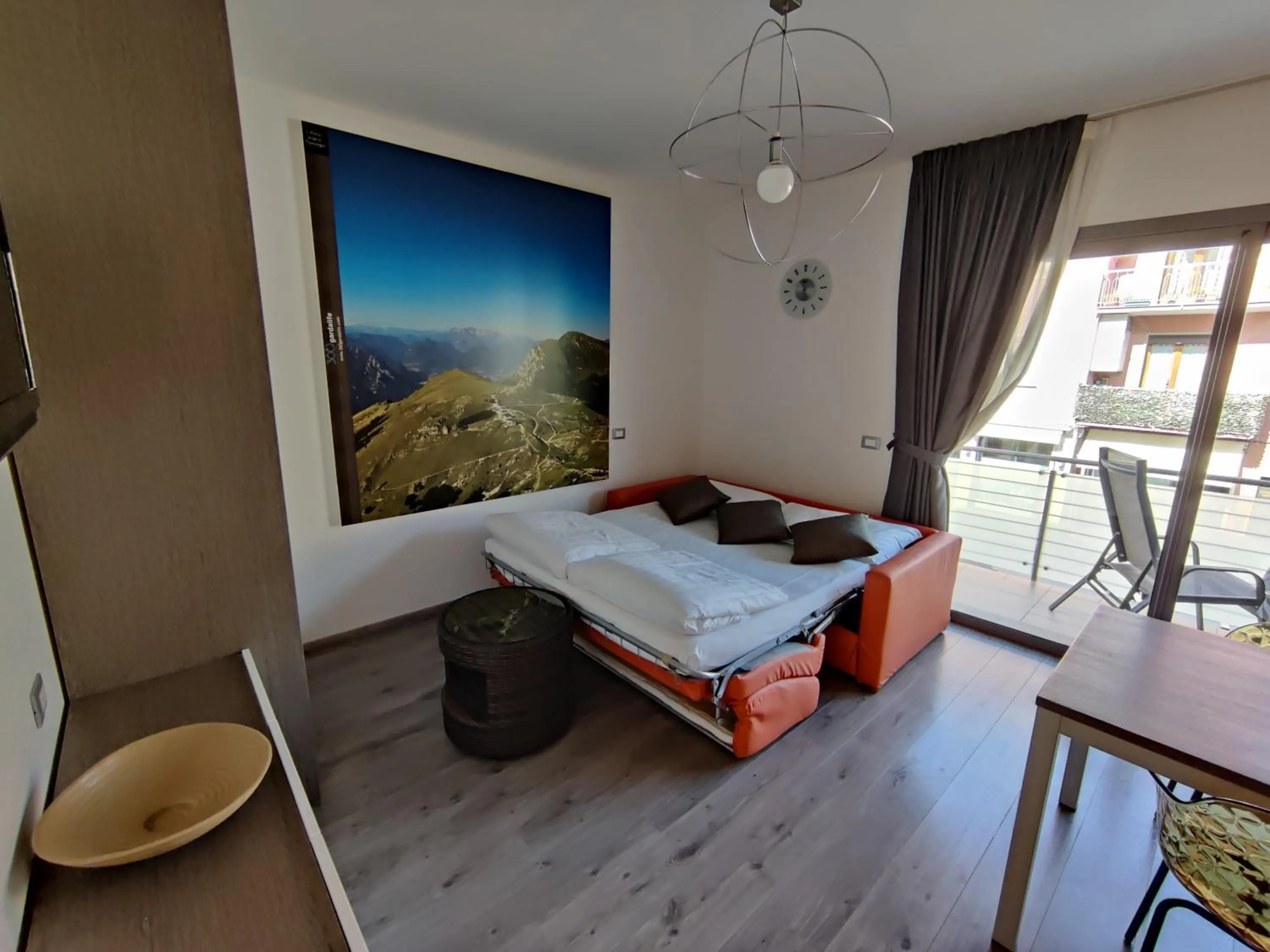 Seating area, Bed in Gardesana Active Apartments