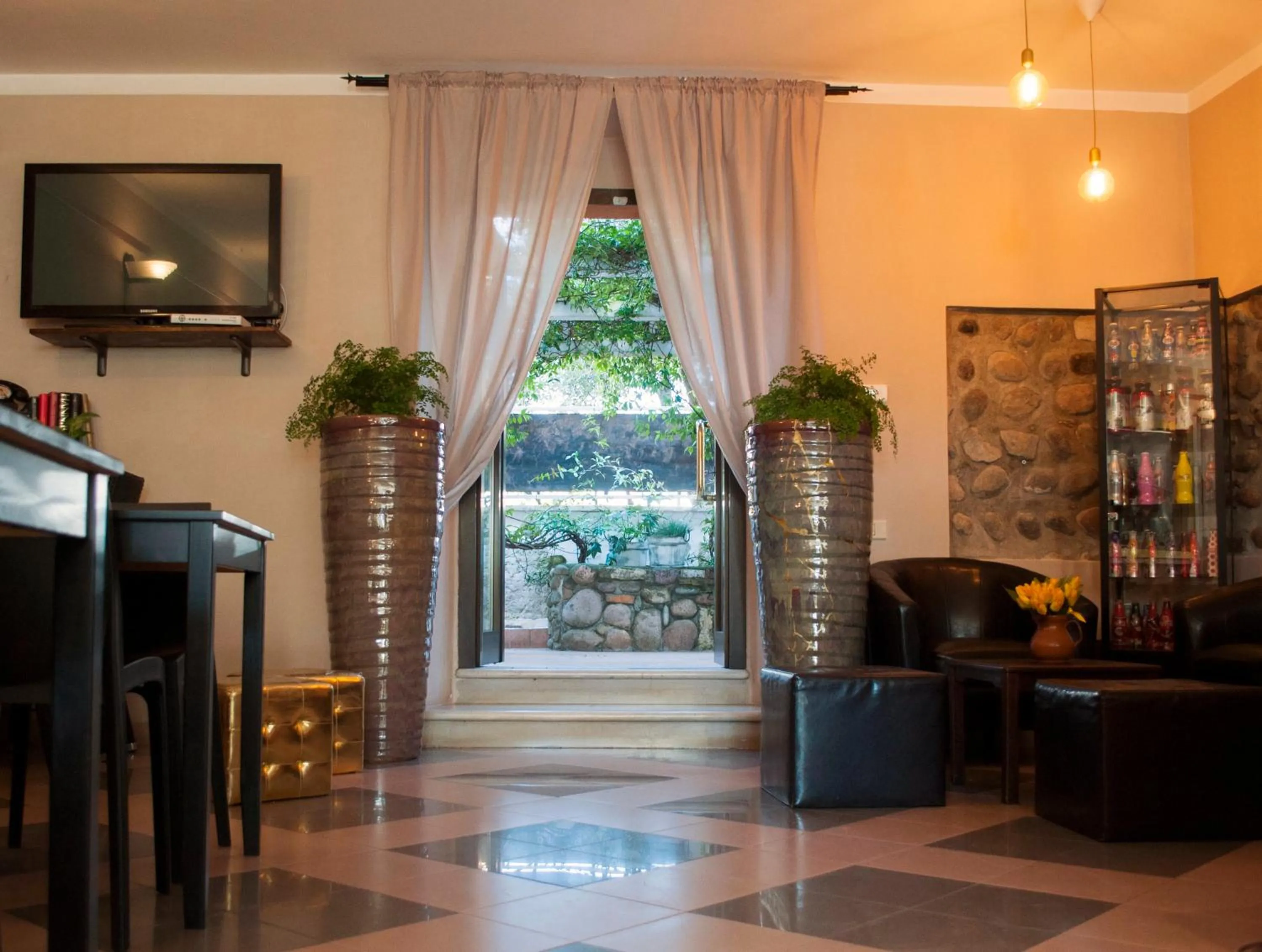 Communal lounge/ TV room in Boutique Hotel Corte Malaspina