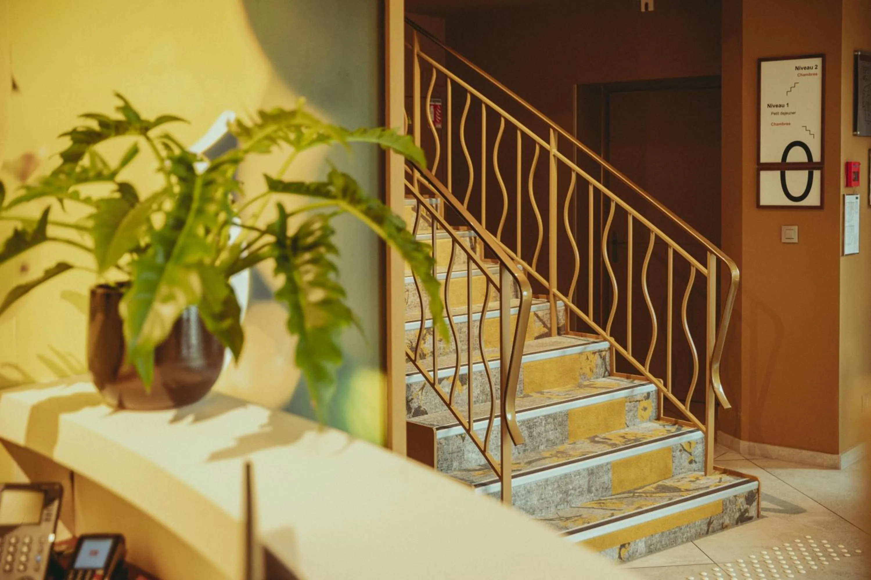 Lobby or reception in Auberge de Clochemerle - Spa & Restaurant gastronomique étoilé