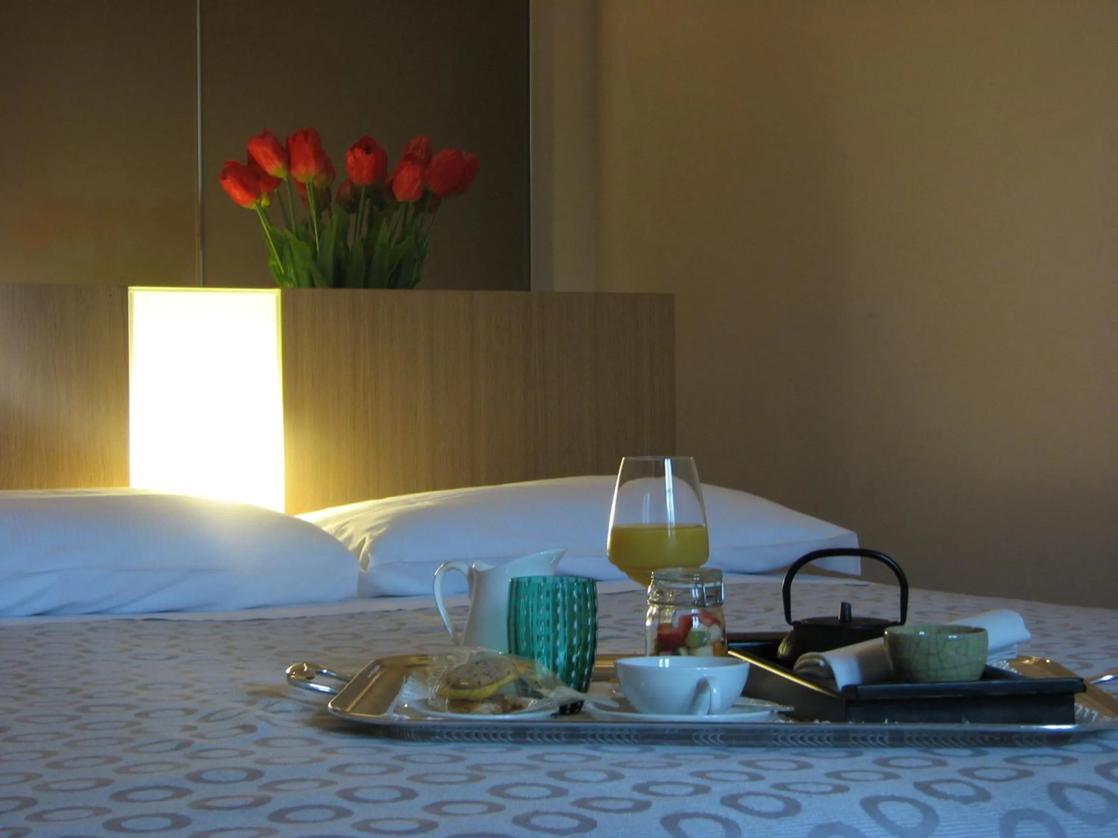 Decorative detail, Bed in Parizzi Suites & Restaurant